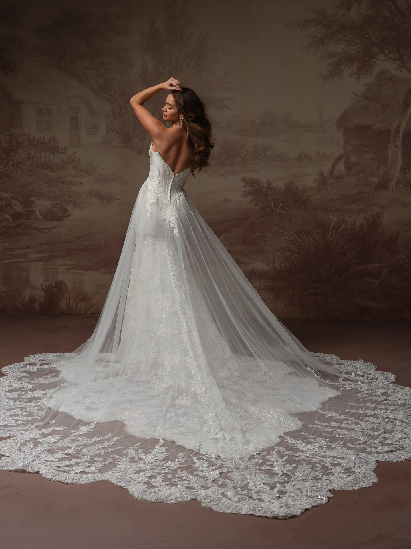 Sottero and Midgley Eirawen lace fit-and-flare wedding dress, back view.
