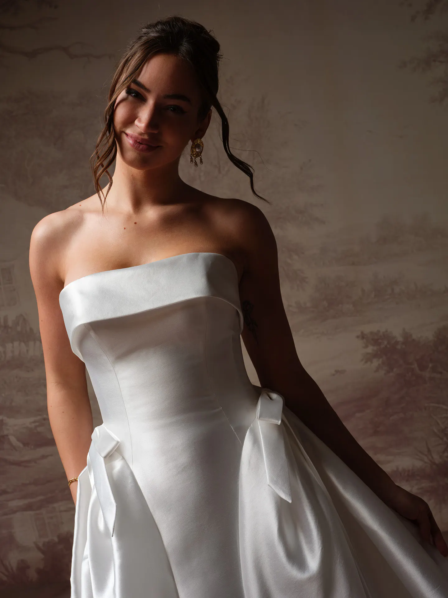 Sottero and Midgley Gemma satin ballgown, front view with side bows.