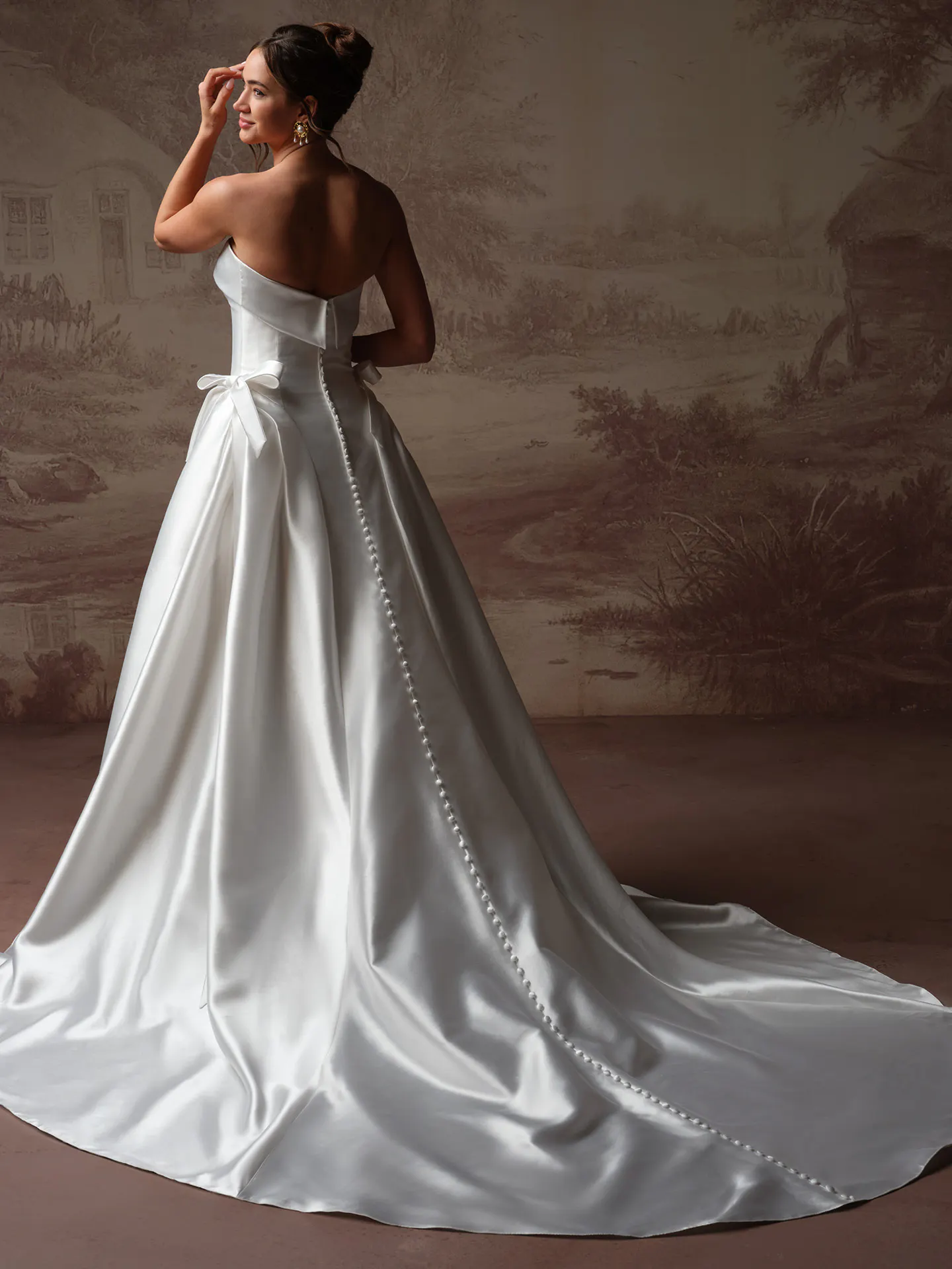 Sottero and Midgley Gemma, back view satin ballgown with side bow.