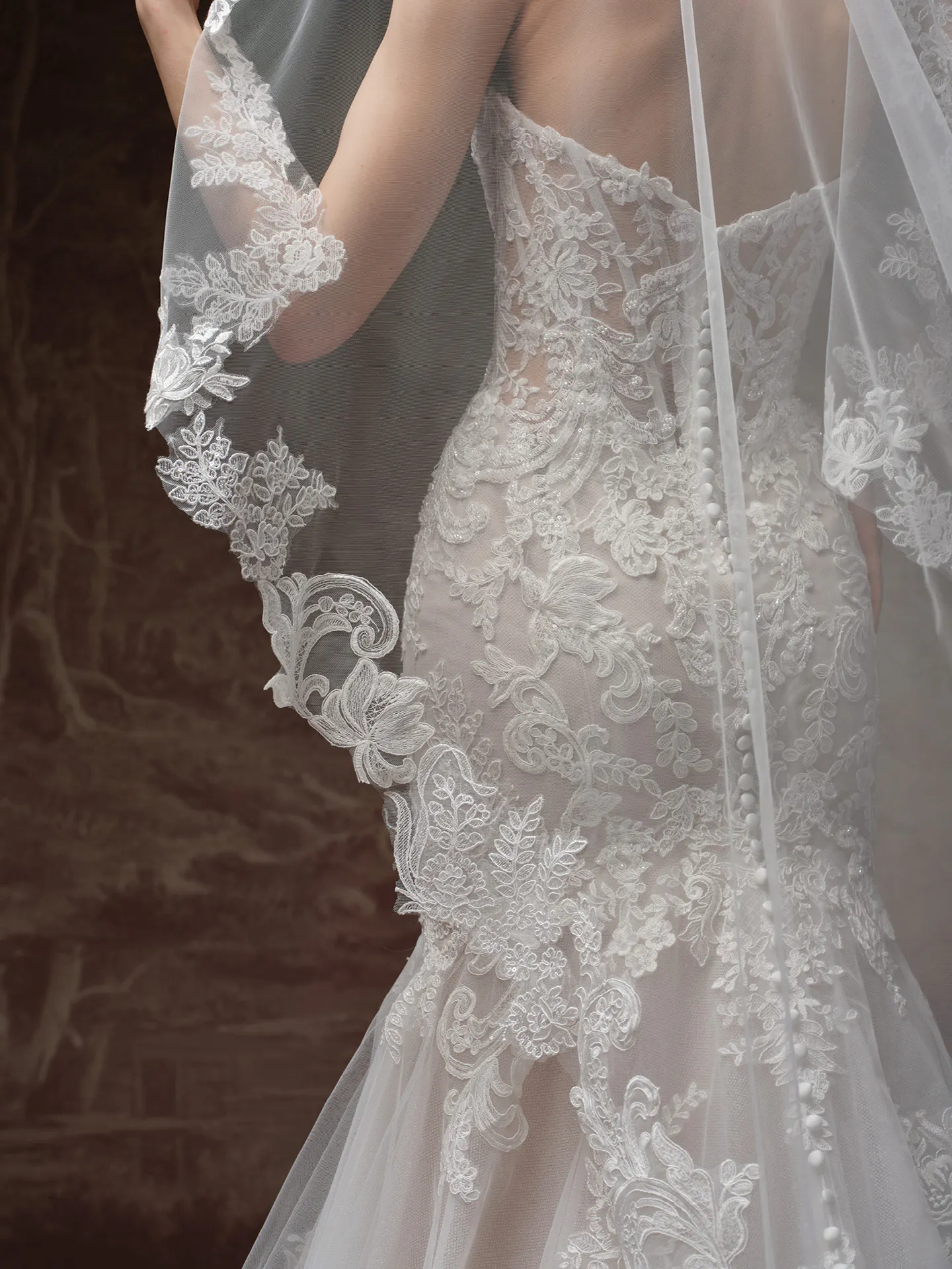 Sottero and Midgley Julianna, back view, beaded lace fit-and-flare wedding dress.