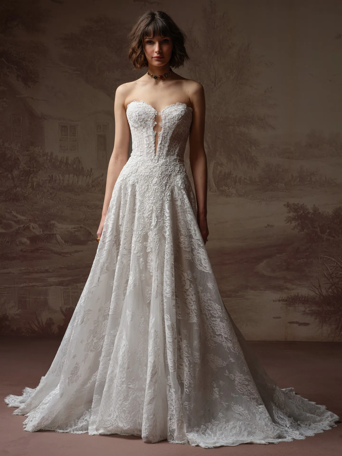 Sottero and Midgley Keeva, front view lace A-line dress with plunging neckline.