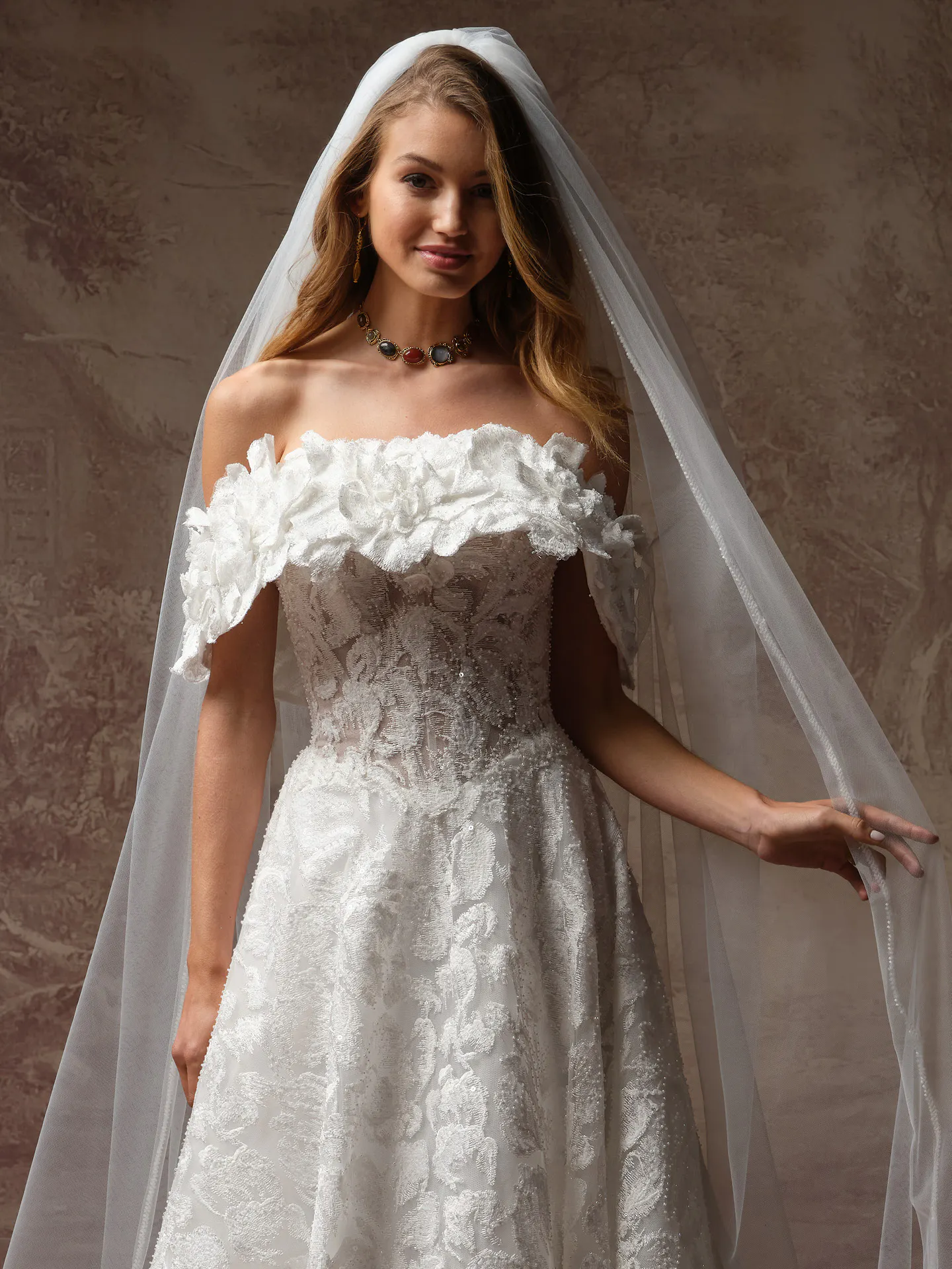 Sottero and Midgley Merrigan detachable shoulder wrap, front view.