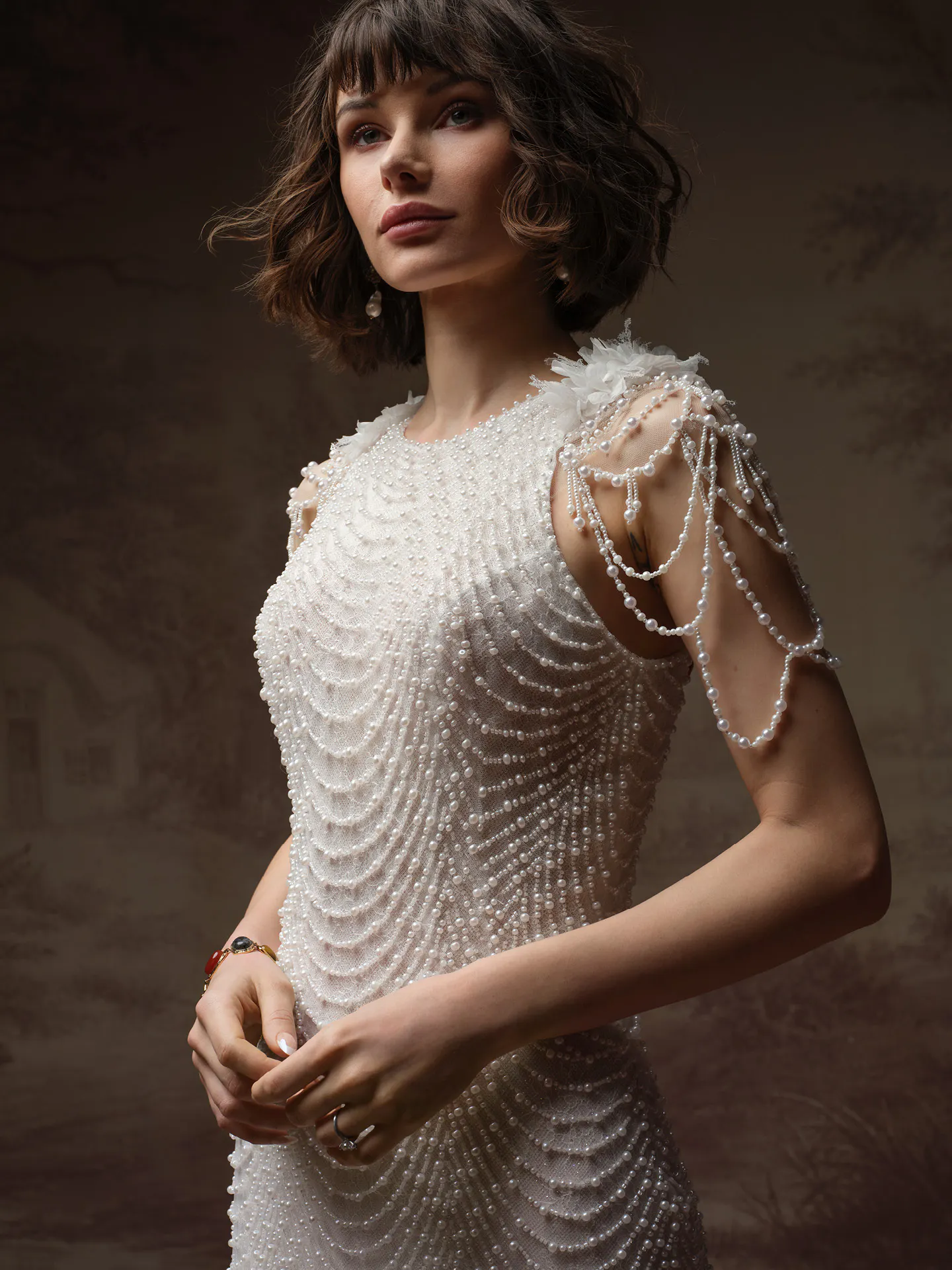Sottero and Midgley Oleta pearl lace sheath dress, side view.