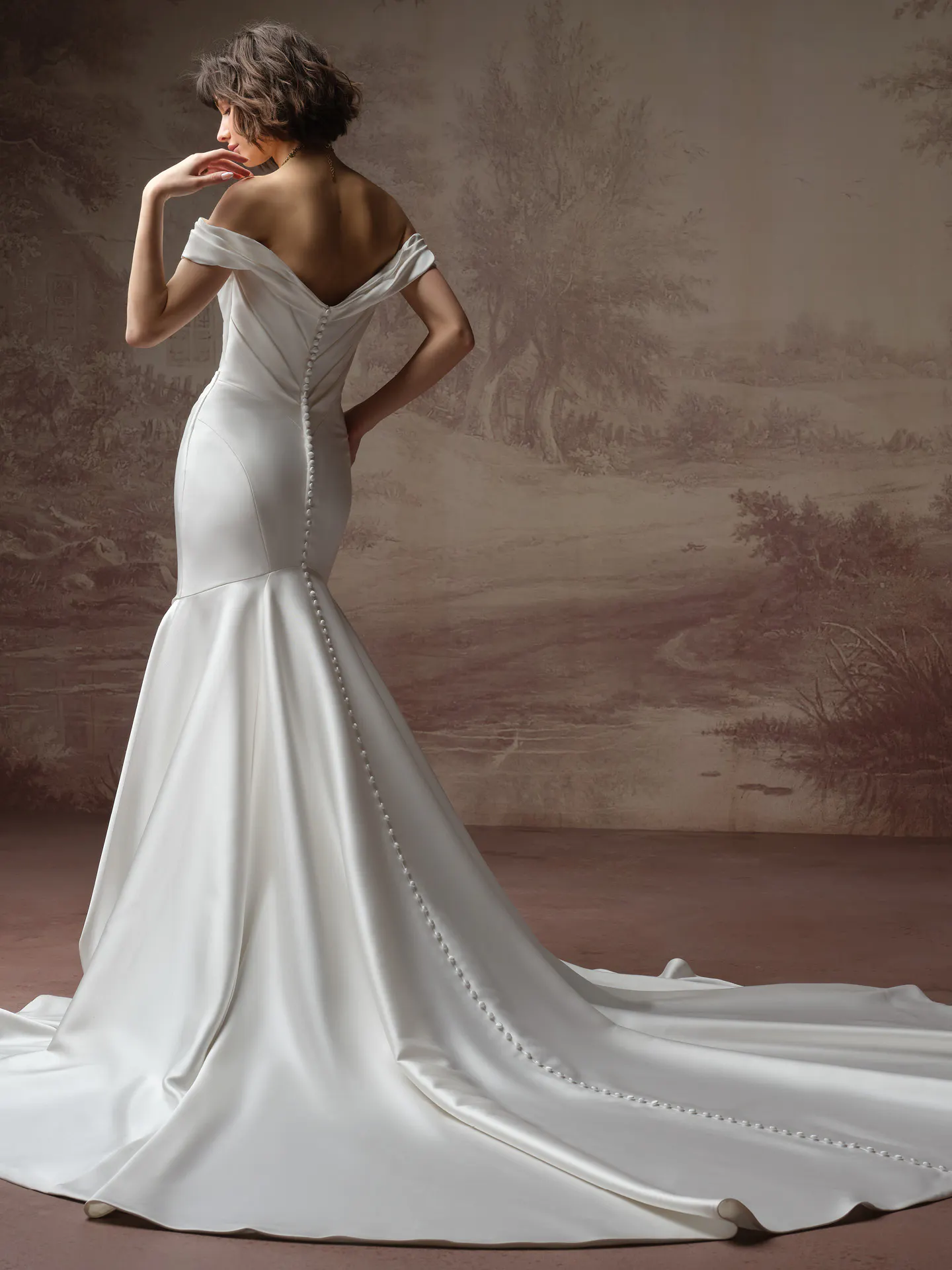Sottero and Midgley Recine satin fit-and-flare wedding dress, back view.