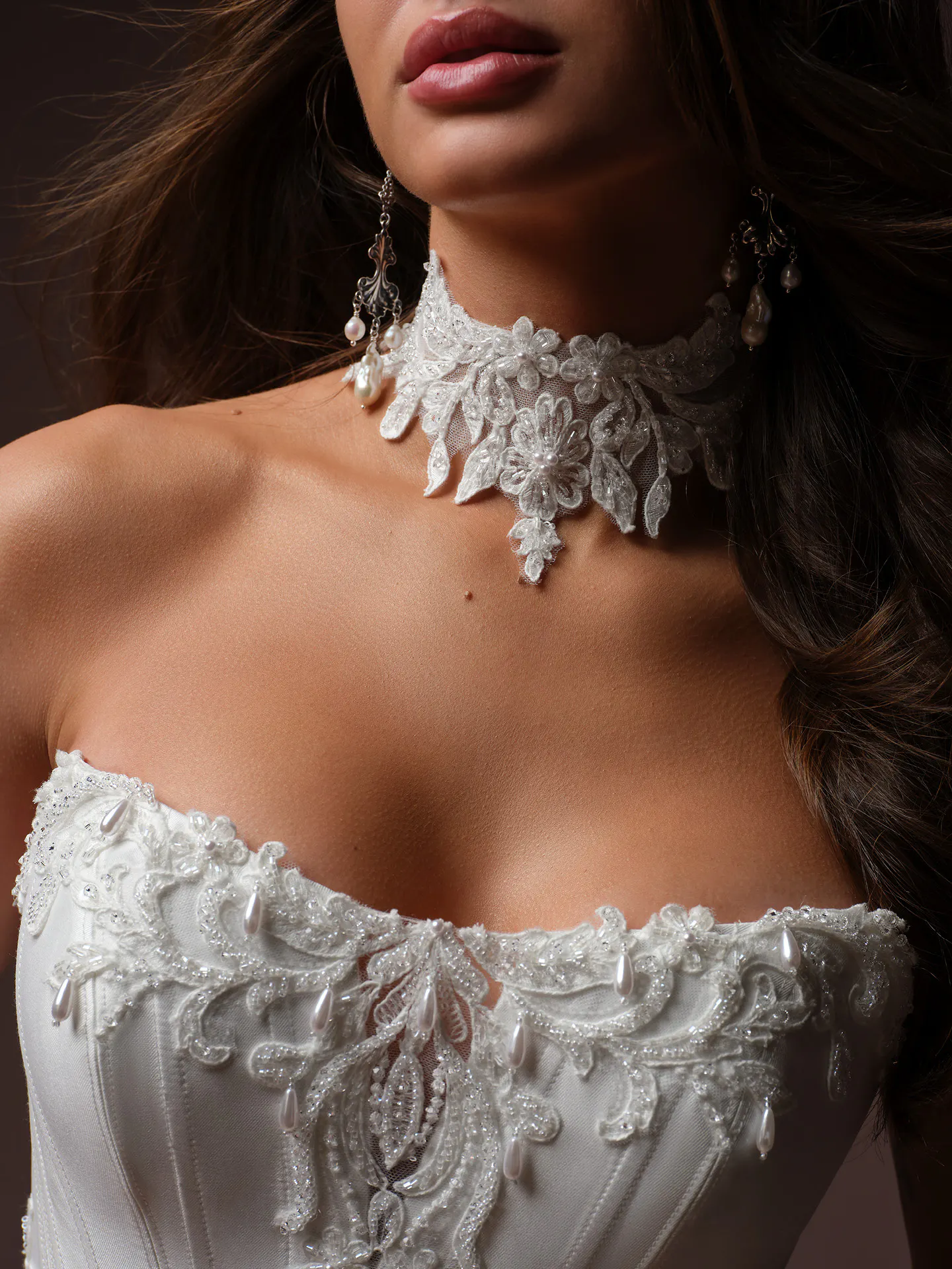 Sottero and Midgley Sandrine lace wedding dress close-up showing intricate lace details.