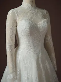 Ornate high neck lace bridal jacket
