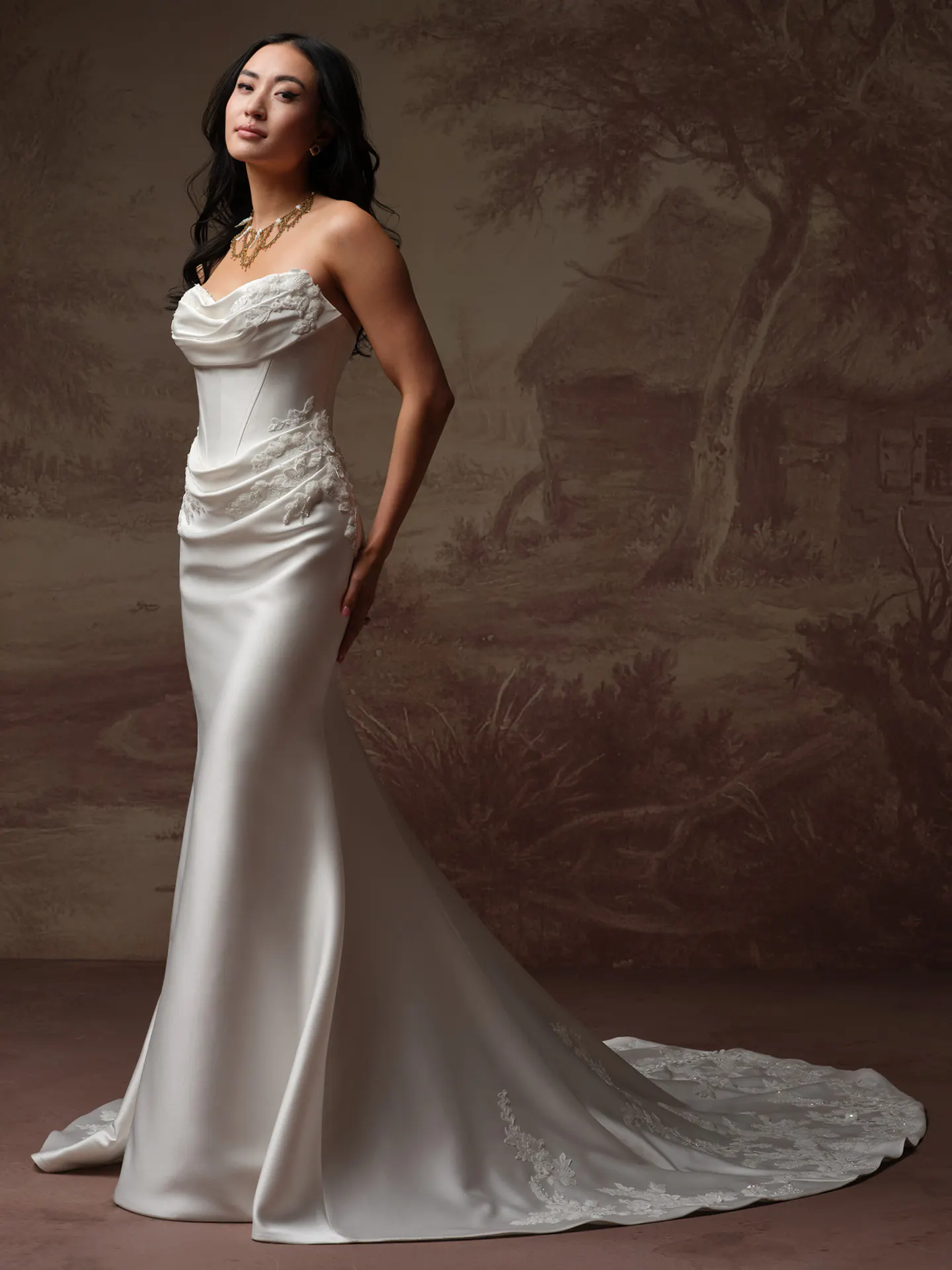 Sottero and Midgley Yadira fit-and-flare wedding dress with long skirt front view.