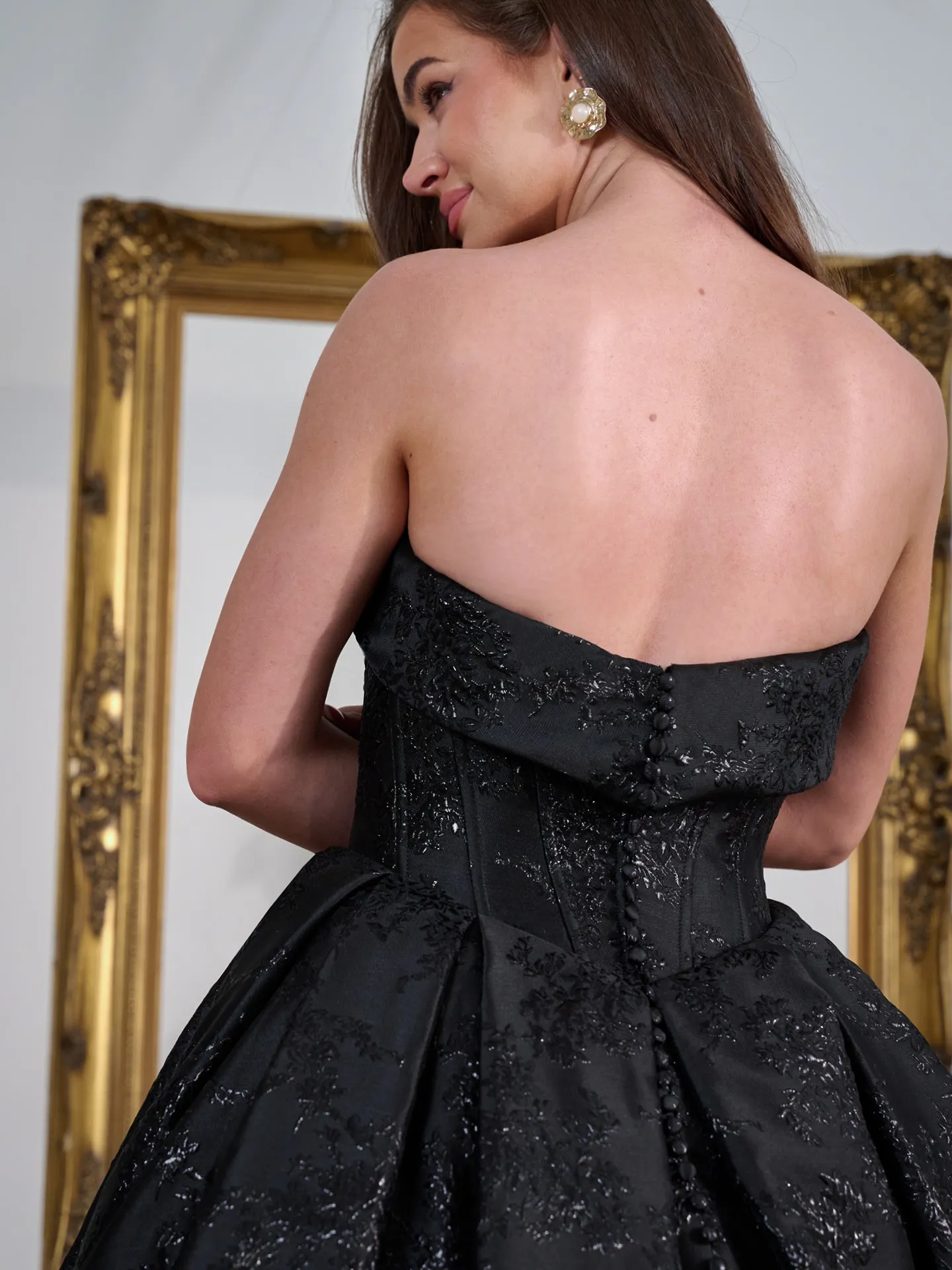 Sottero and Midgley black floral jacquard ball gown back view