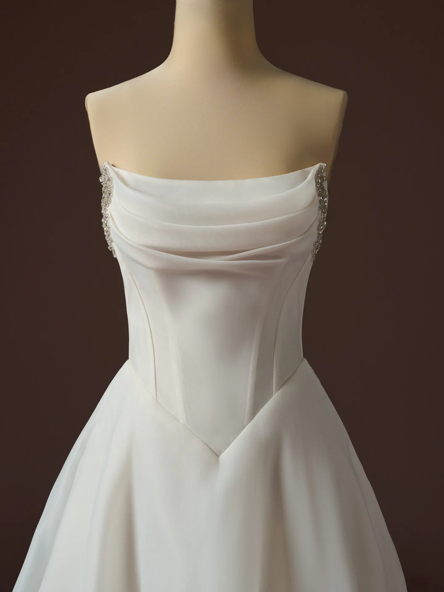 Maggie Sottero Abilene front view organza A Line dress with basque waist.