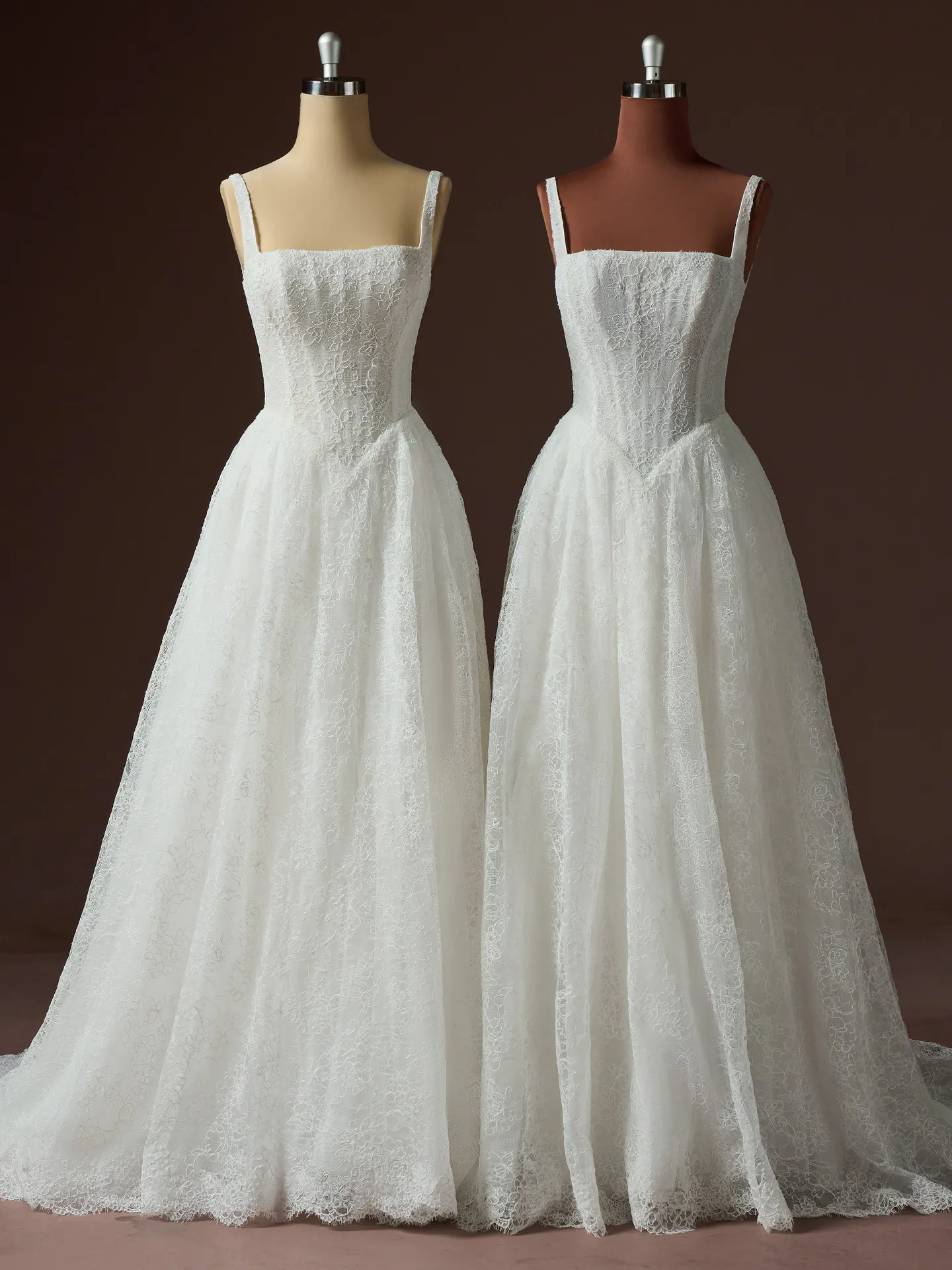 Maggie Sottero Autumn front view A Line lace wedding dress on mannequins.
