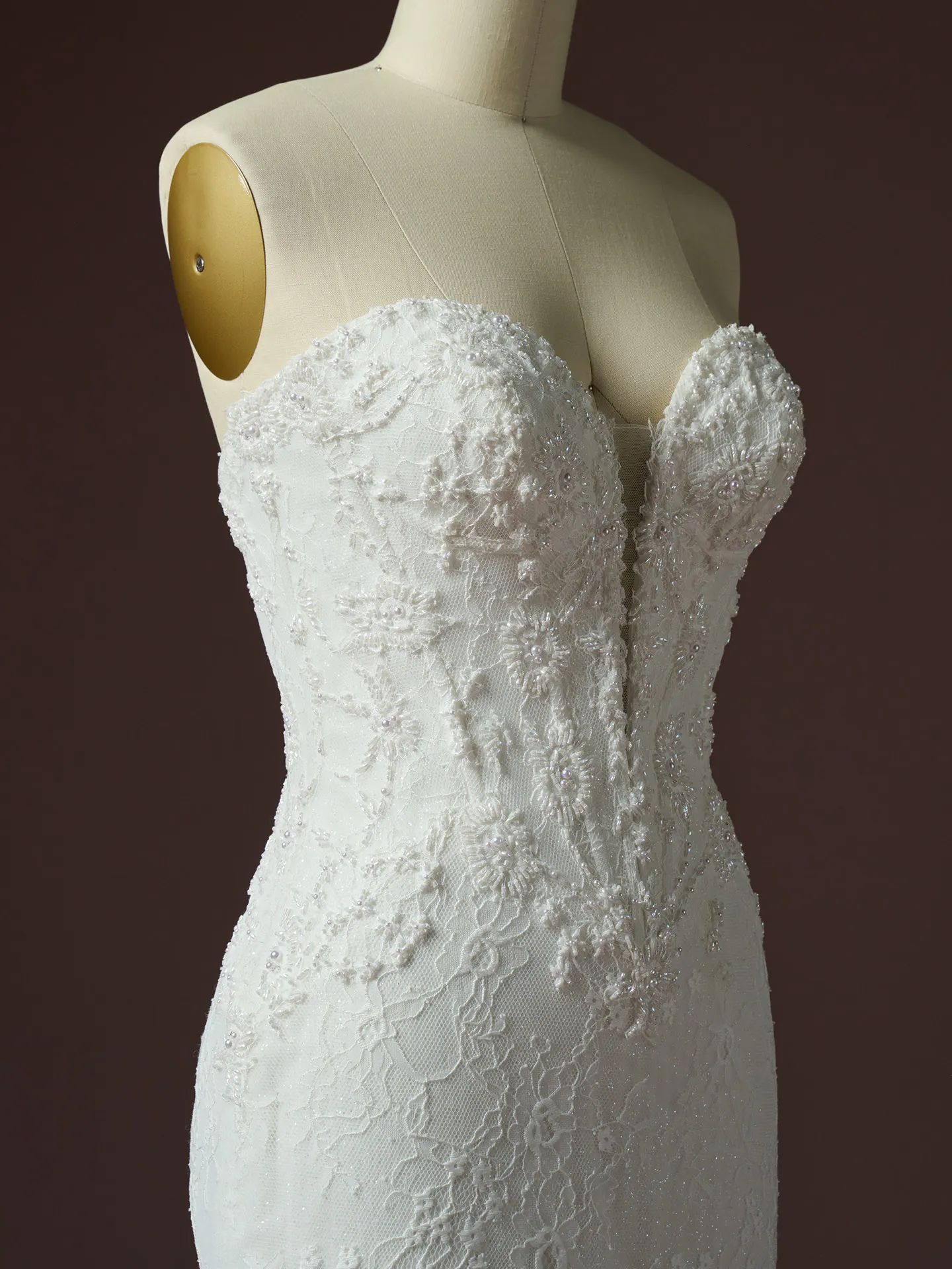 Maggie Sottero Bellevue Royale beaded lace fit-and flare dress side view on mannequin.