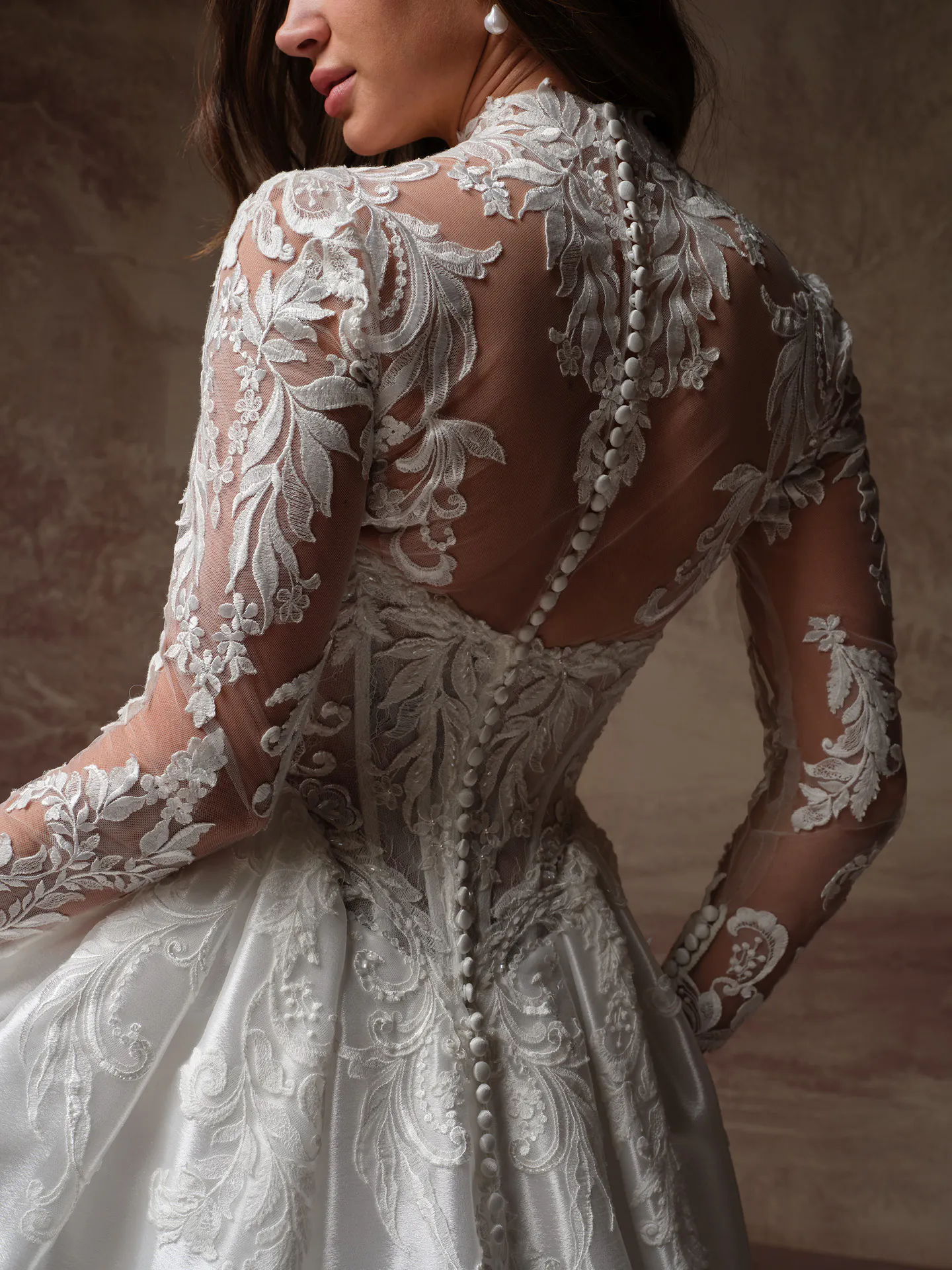 Maggie Sottero Dahlia back view lace organza wedding dress with floral embroidery.