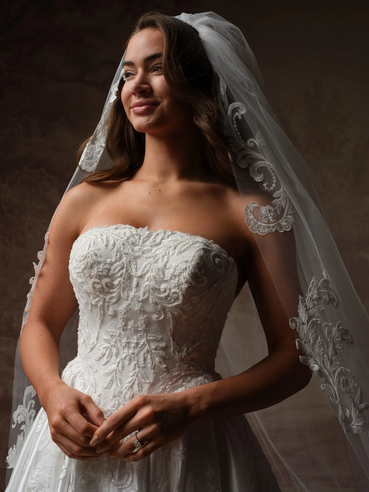 Maggie Sottero Dahlia strapless lace organza wedding dress front view.