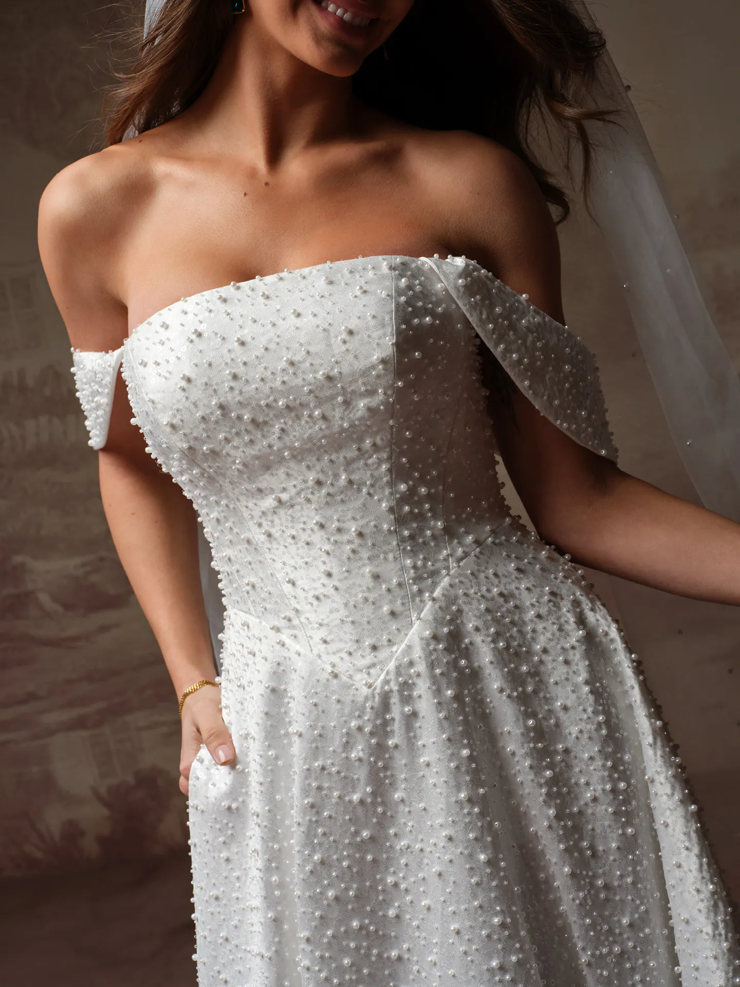 Maggie Sottero Elowyn front view beaded wedding dress with straight neckline.