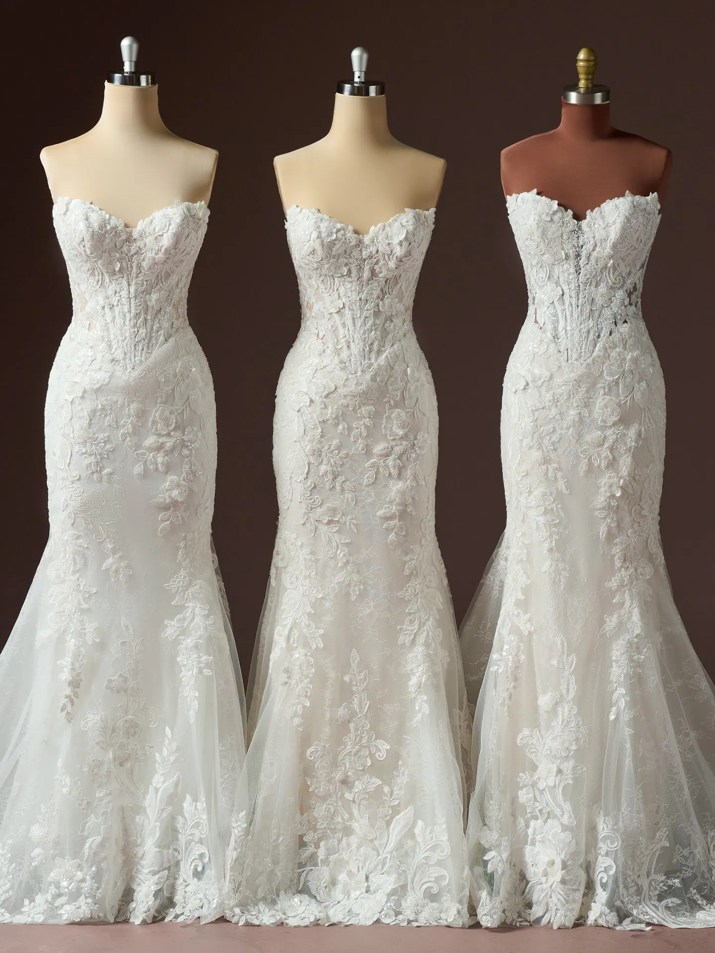 Maggie Sottero Estelle lace wedding dress front view on dress forms.