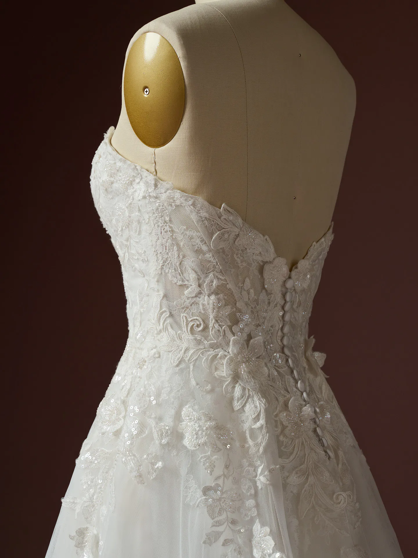 Maggie Sottero Kate A Line dress with beaded floral lace back view.