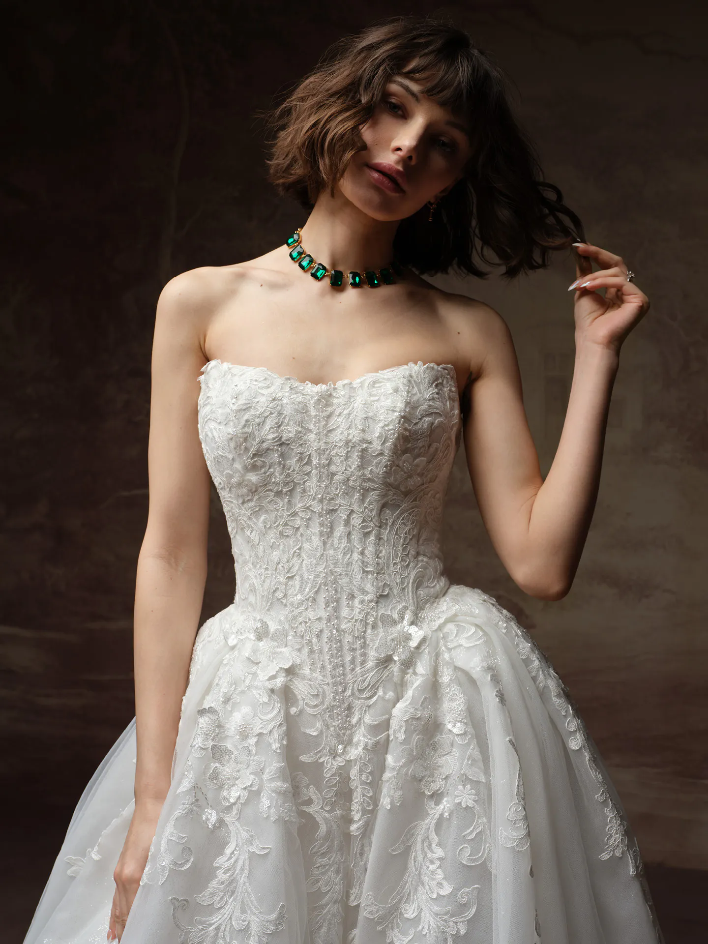 Maggie Sottero Lyra front view, lace bodice, basque waist, glitter tulle.