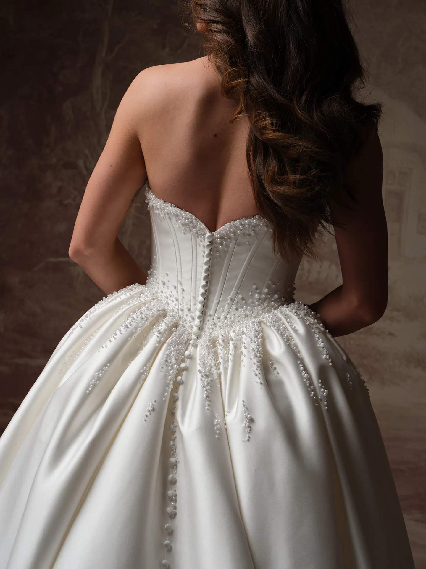 Rebecca Ingram Melissa back view satin mermaid dress with pearl details.