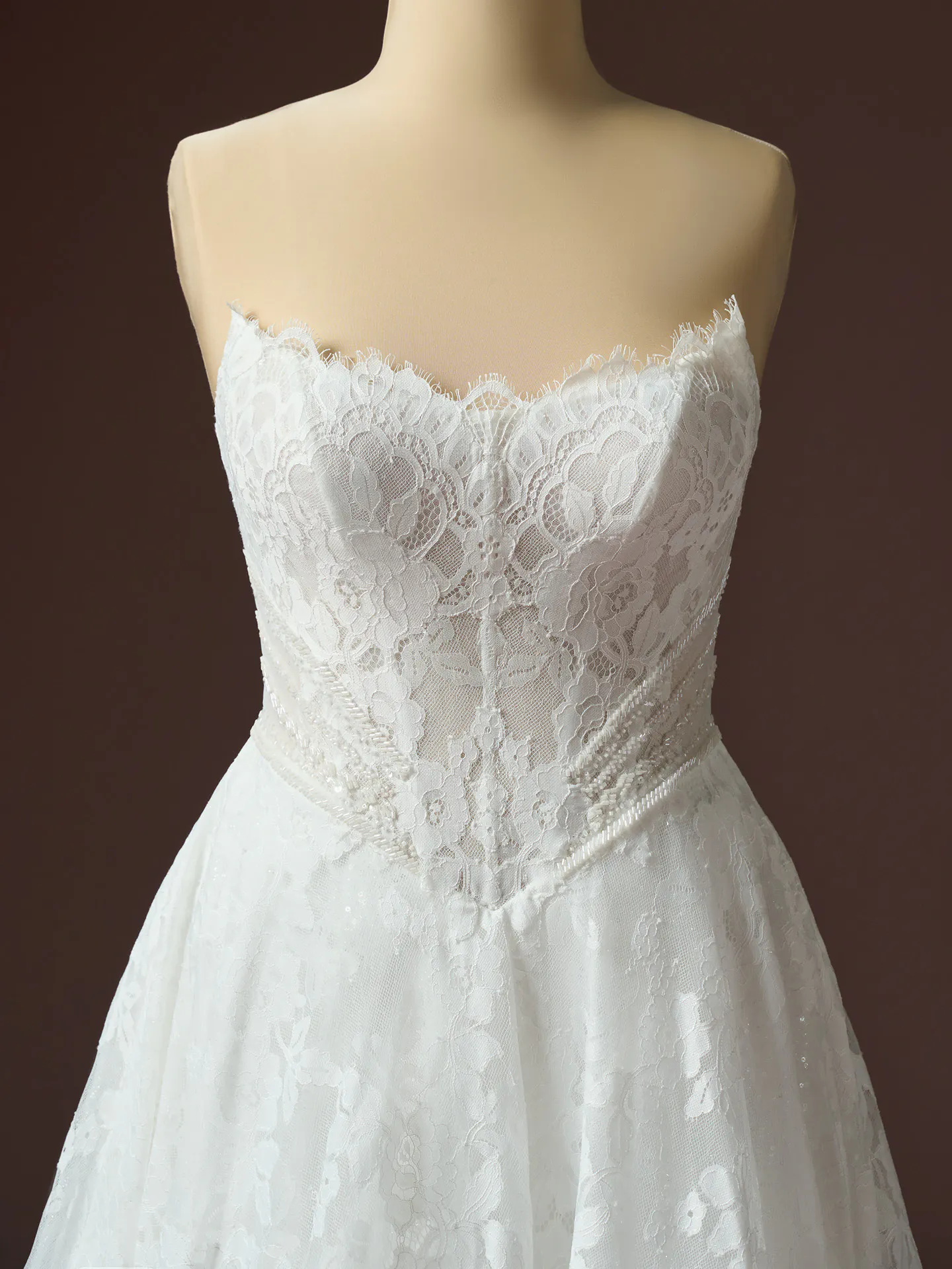 Maggie Sottero Mischa lace glitter tulle A-line dress front view.