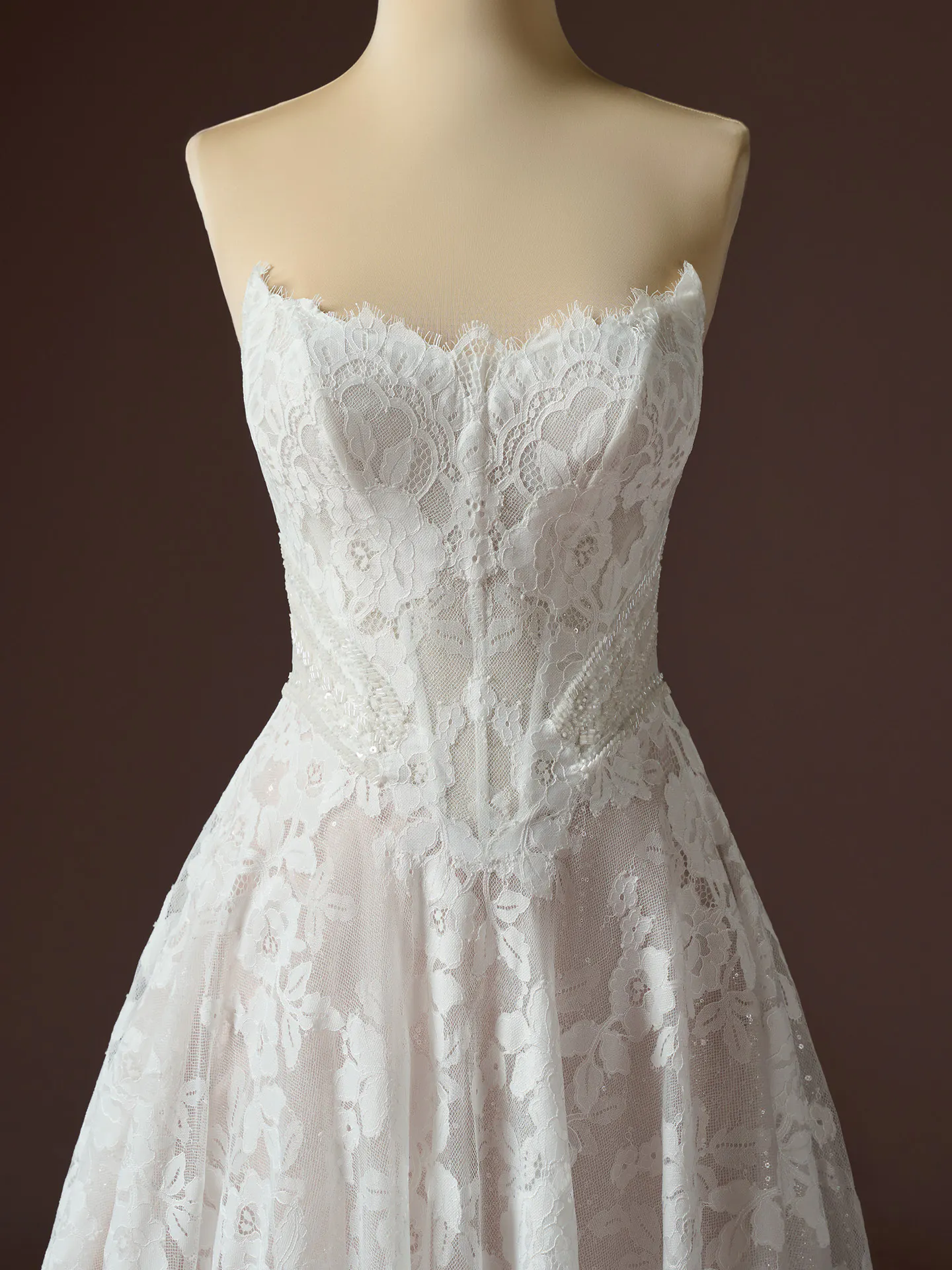 Maggie Sottero Mischa lace A-line wedding dress front view.