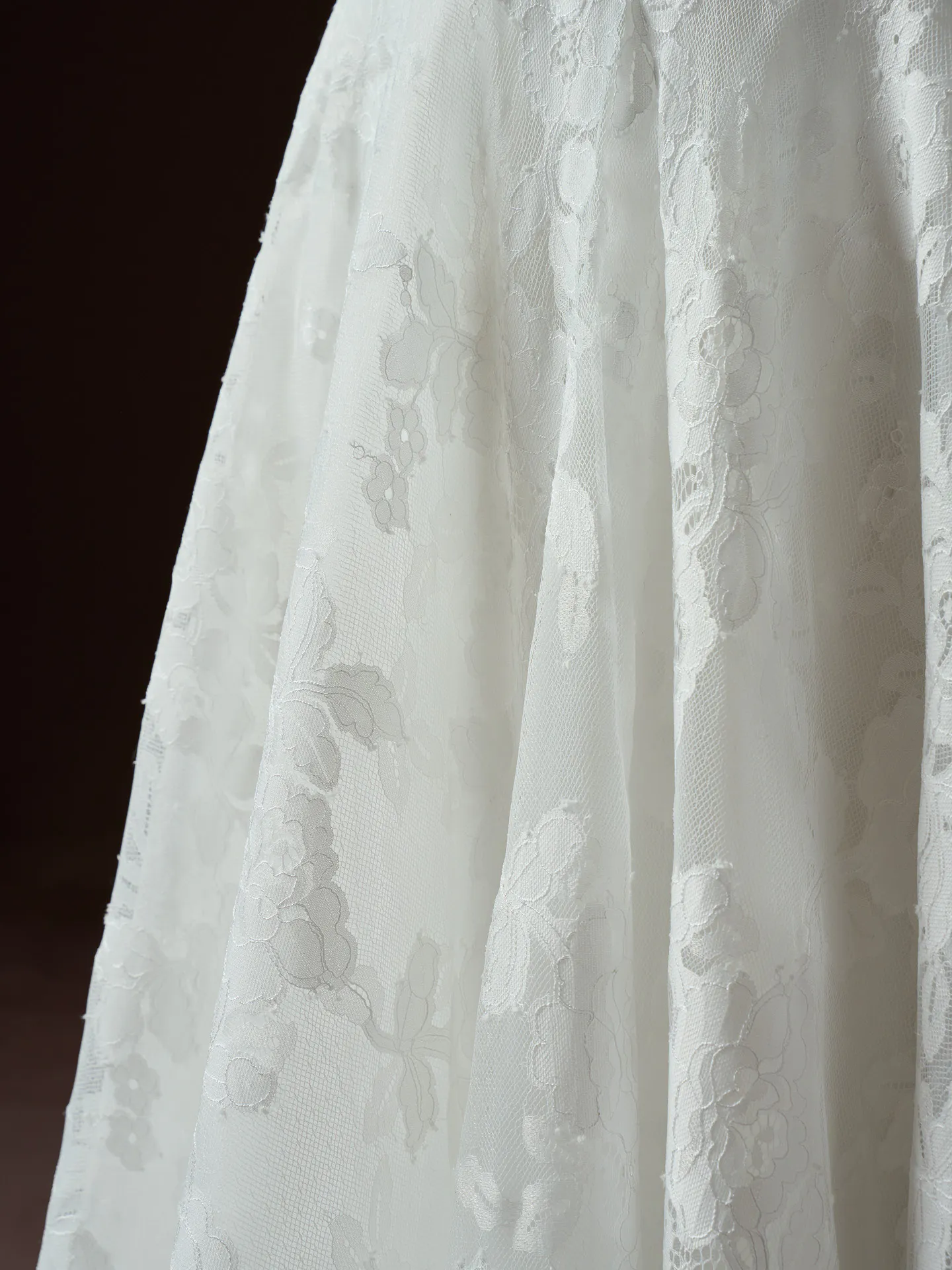 Maggie Sottero Mischa lace glitter tulle A-line closeup.