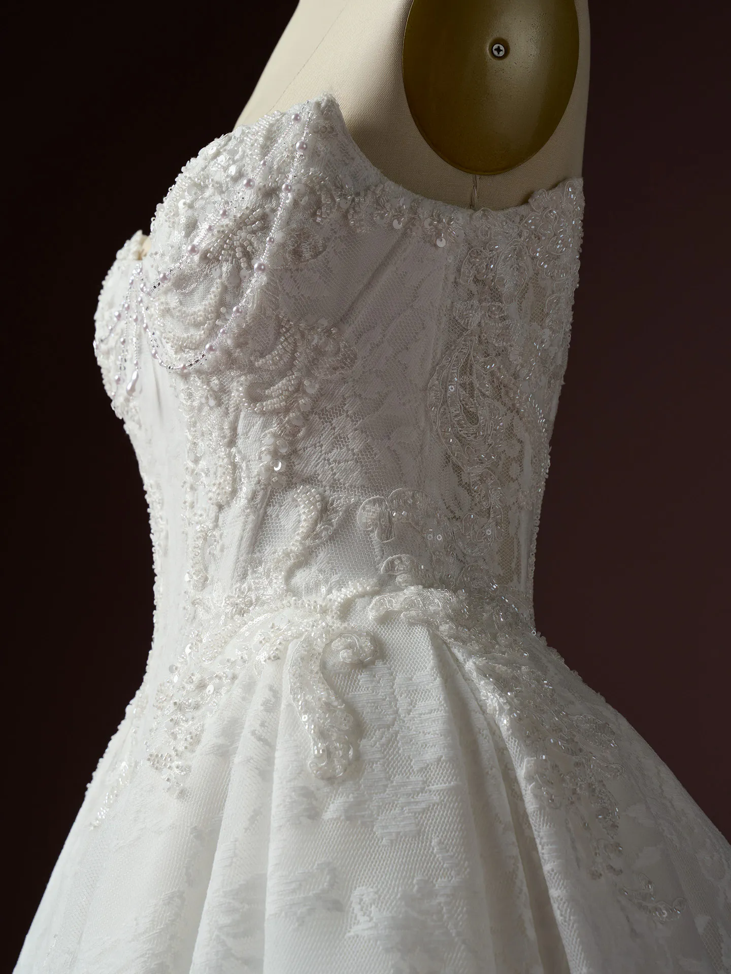 Maggie Sottero Ryland side view Chantilly lace ballgown detailed beading.