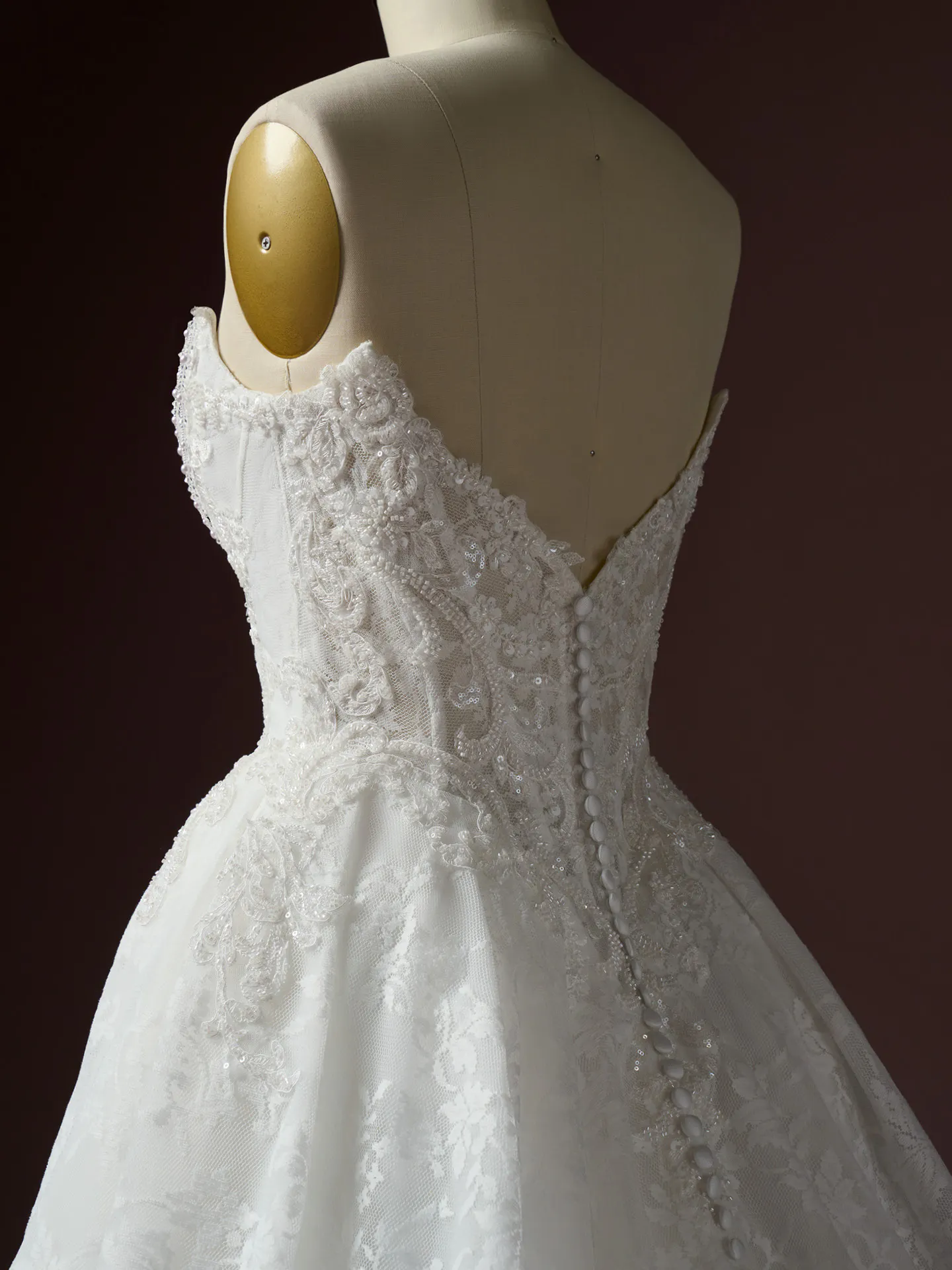 Ryland side view lace ballgown with buttons Maggie Sottero.