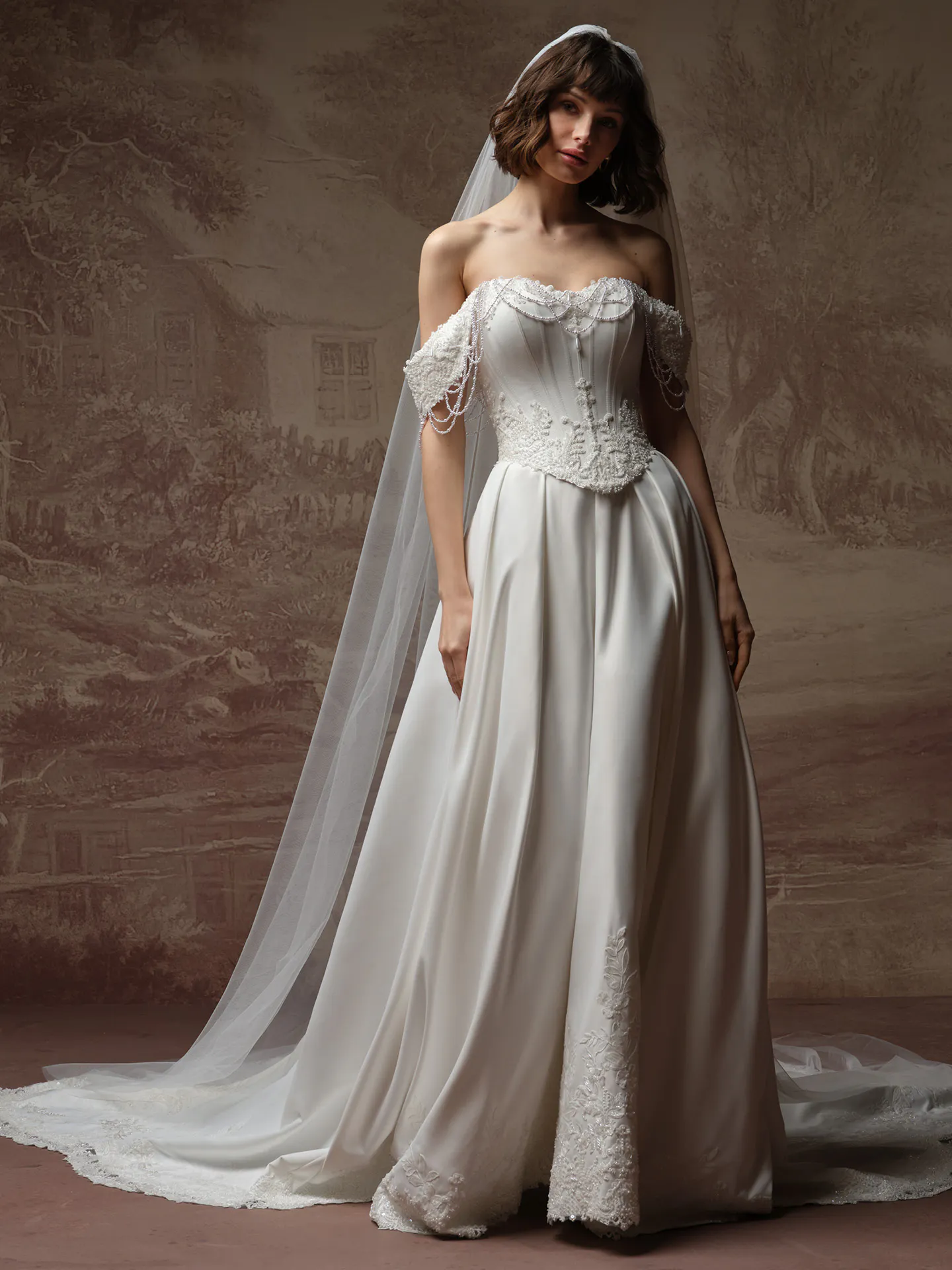 Maggie Sottero Seattle A Line dress front view with pearl detail and satin fabric.