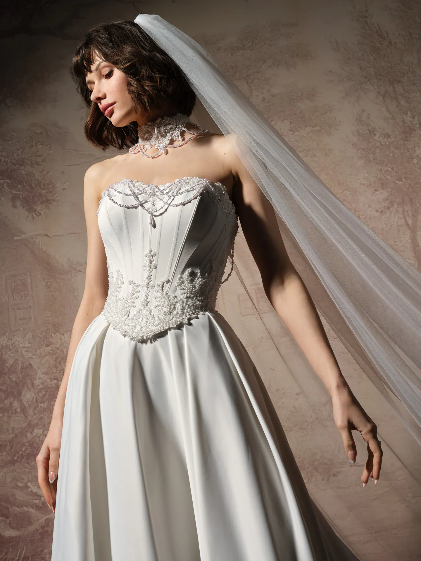 Maggie Sottero Seattle front view satin A-line wedding dress with pearl detail.