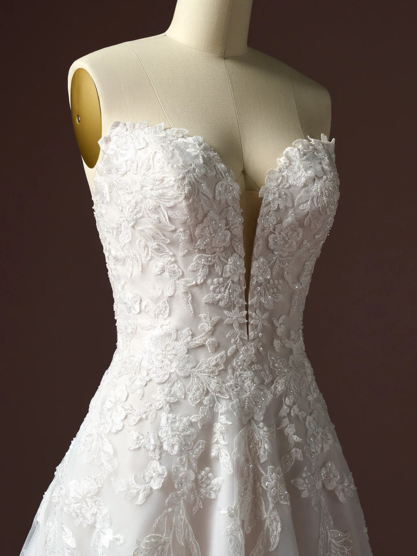 Rebecca Ingram Bernadine, front view, beaded lace sparkle tulle wedding dress on mannequin.