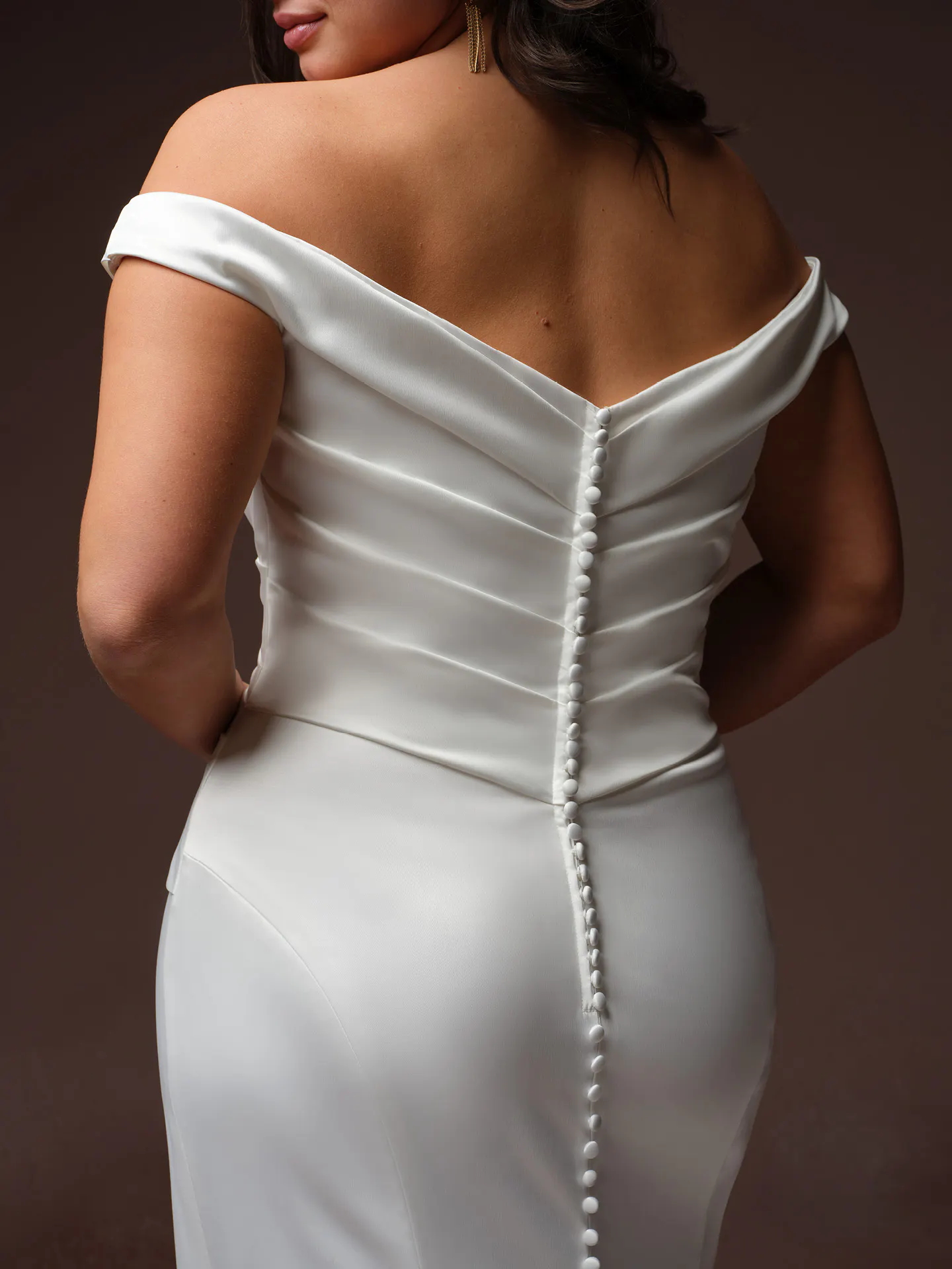 Rebecca Ingram Clementine, back view off-shoulder white dress with buttons.