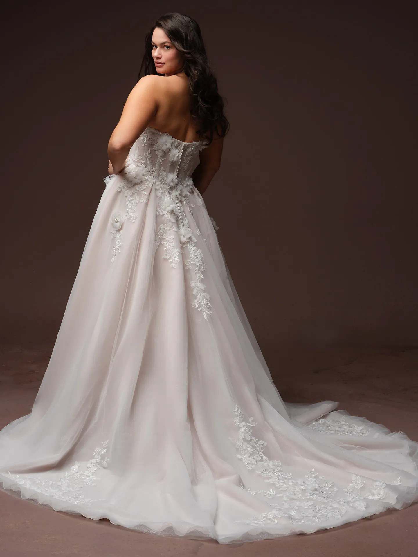 Rebecca Ingram Fleur 3D floral lace wedding dress, back view.