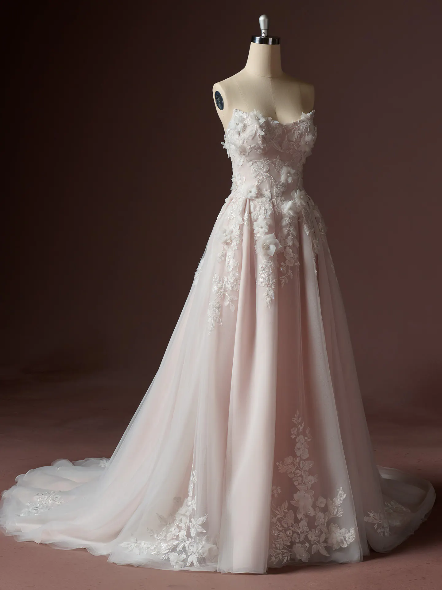 Rebecca Ingram Fleur 3-D floral lace dress on mannequin, front view.