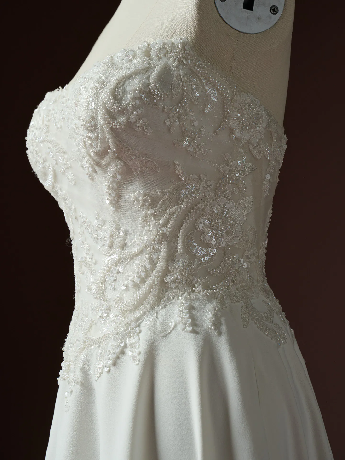 Rebecca Ingram Hazel lace bodice A-Line wedding dress, side view.