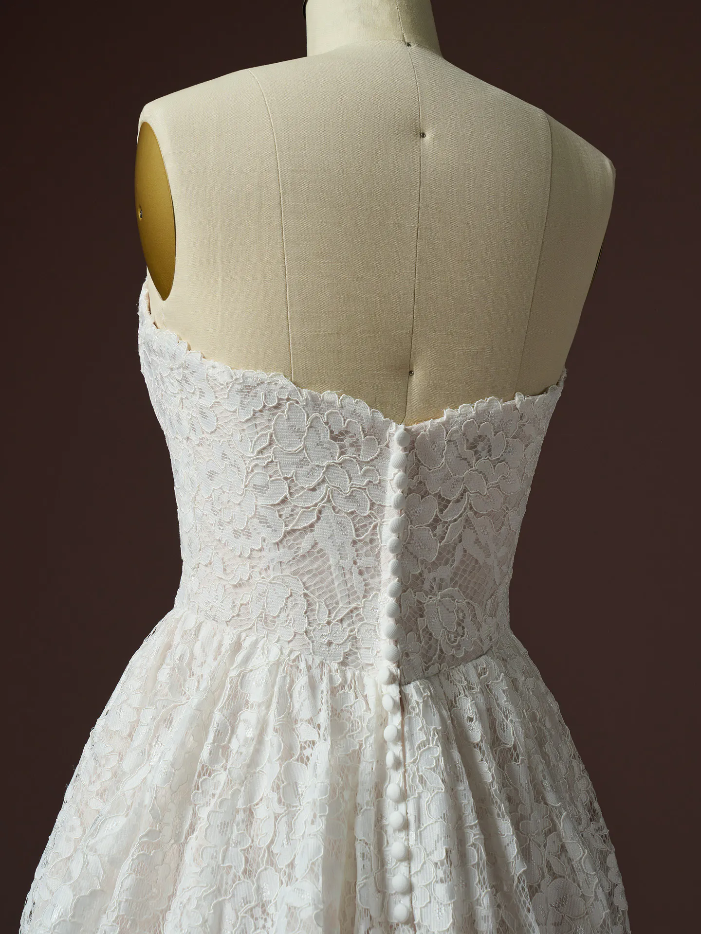 Rebecca Ingram Narelle lace, back view with button detail.