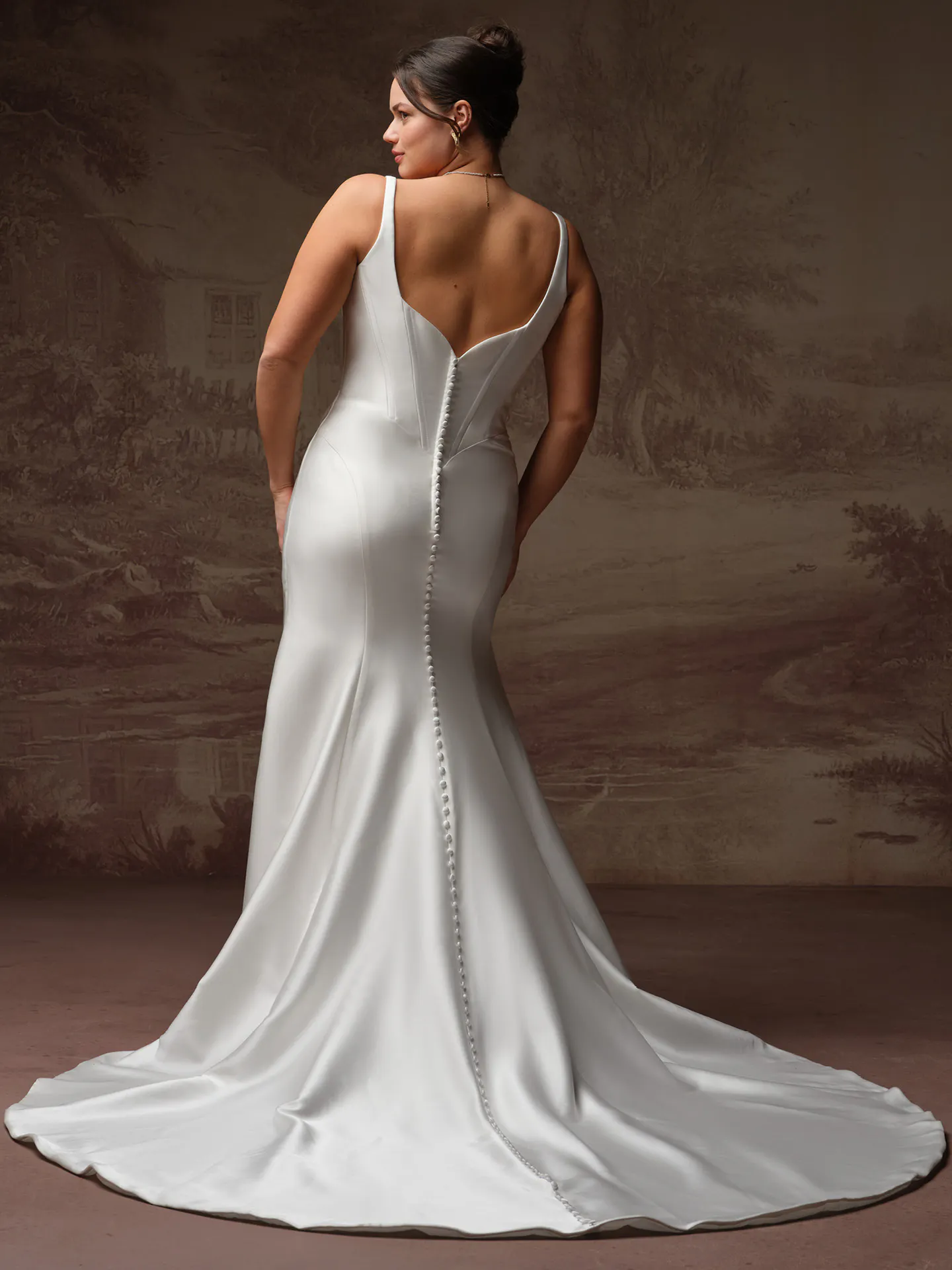 Rebecca Ingram Pamela, back view satin wedding dress with buttons down the train.