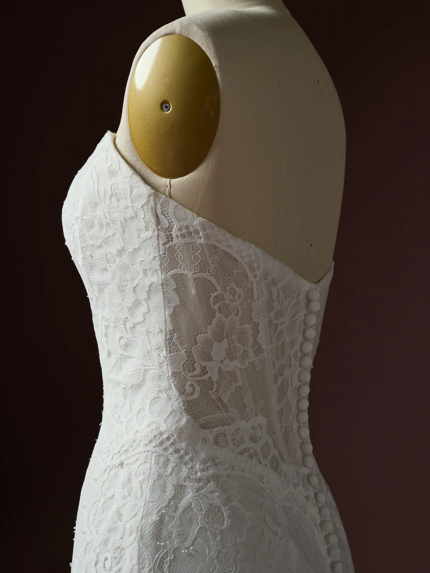 Rebecca Ingram Samira, side view lace button detail.