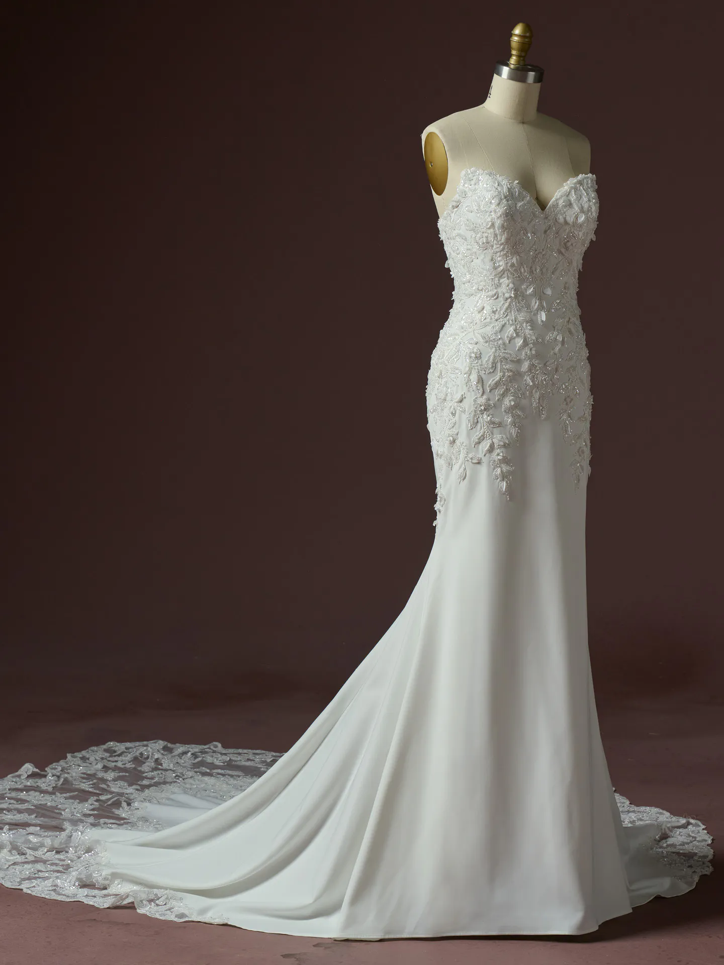 Sottero and Midgley Blair fit-and flare dress on mannequin, lace detail, side view.