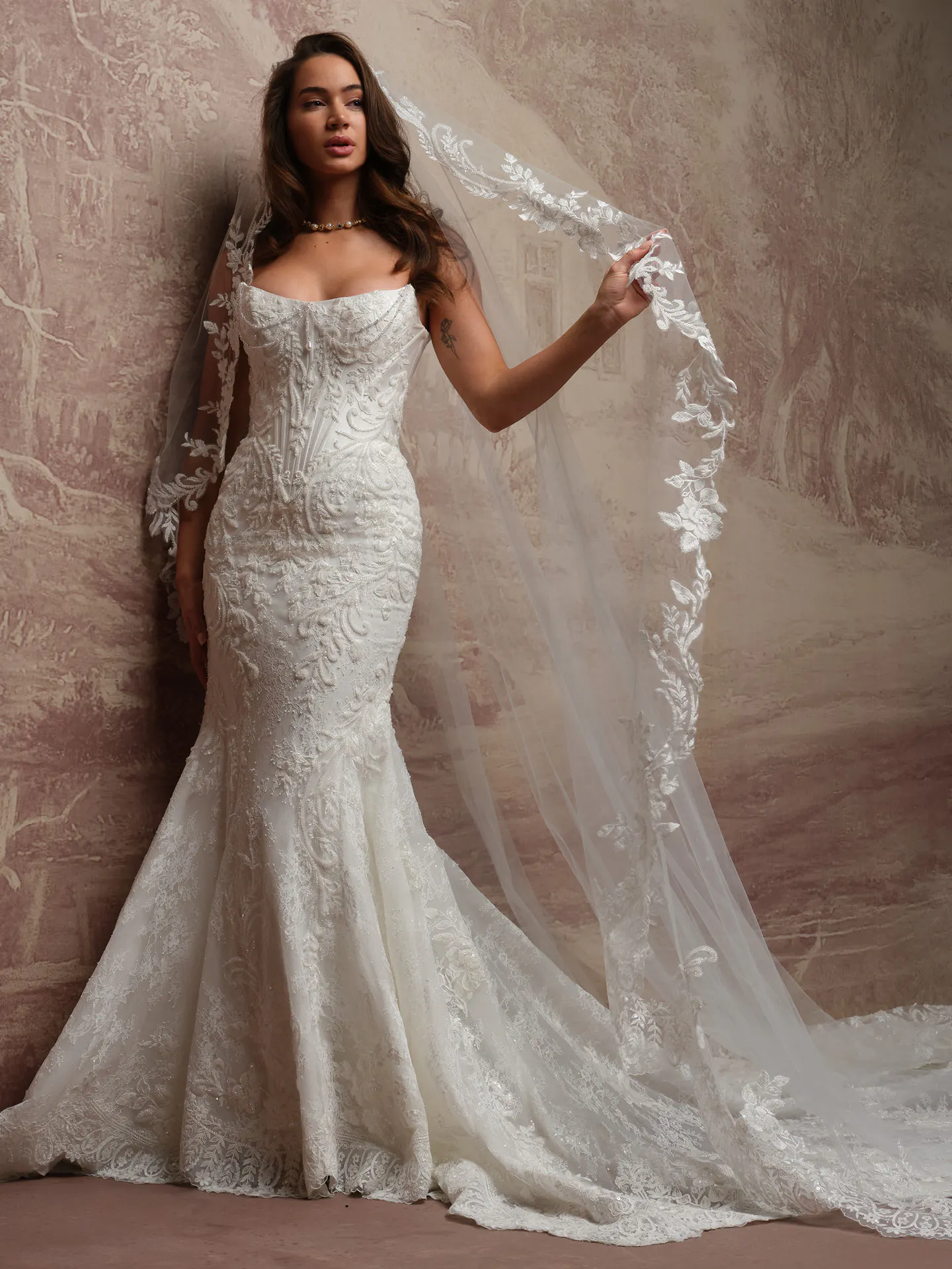 Sottero and Midgley Eirawen fit-and flare lace dress front view with veil.
