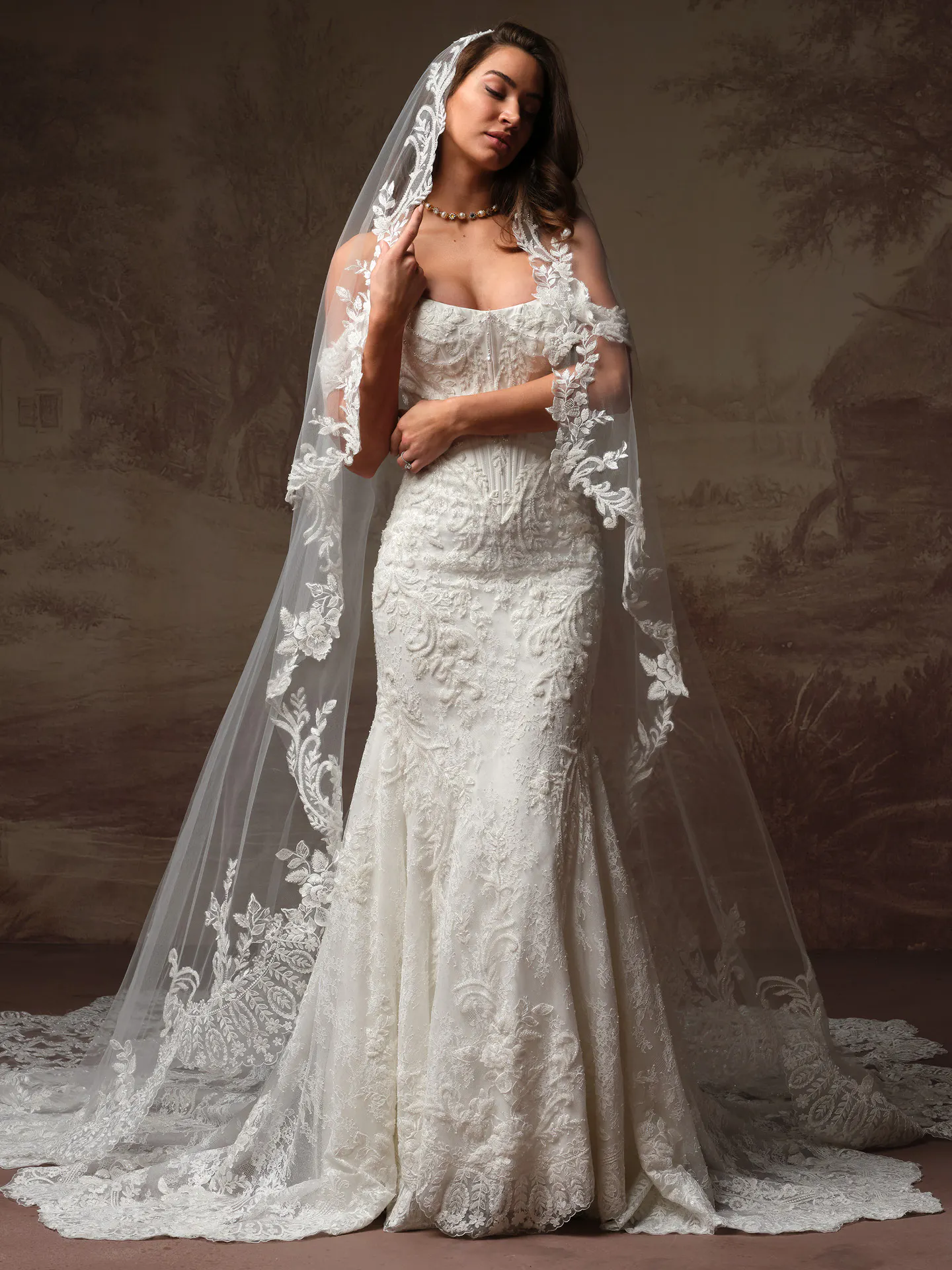 Sottero and Midgley Eirawen front view lace fit-and flare wedding dress with veil.