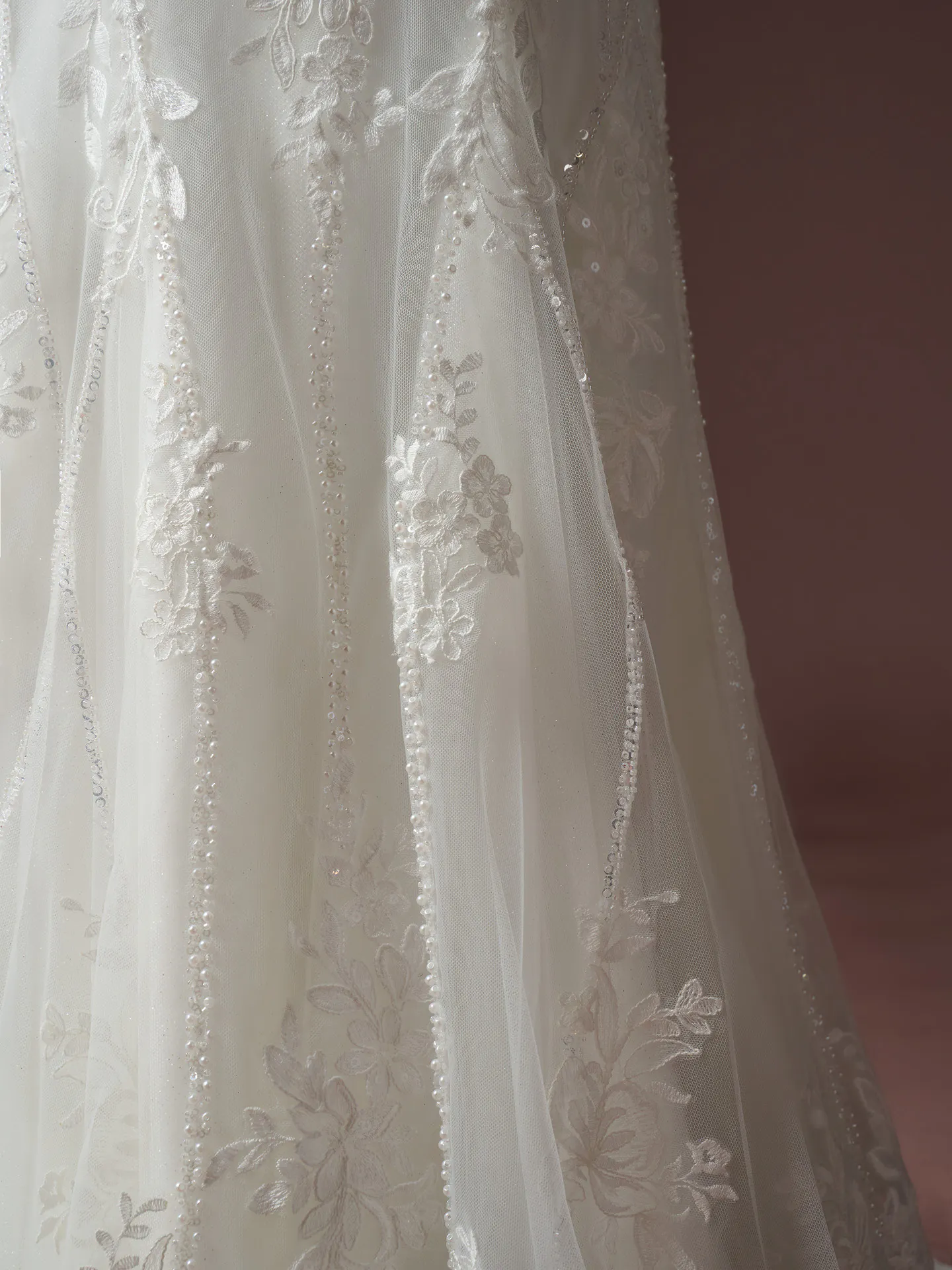 Hester sequined lace bodice with floral patterns Sottero and Midgley.