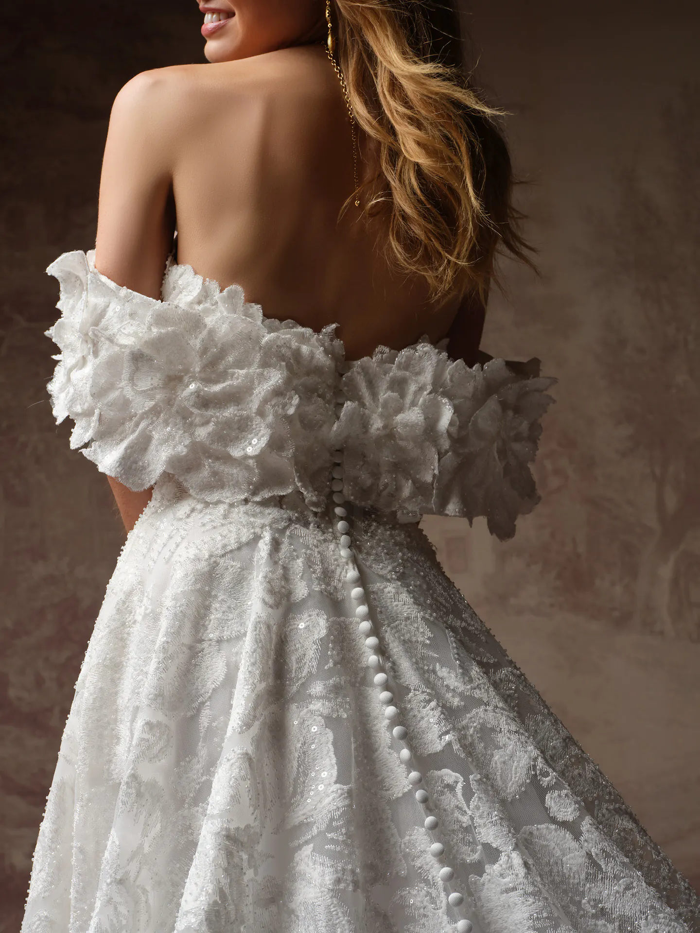 Sottero and Midgley Merrigan, back view lace A-Line dress with floral details.