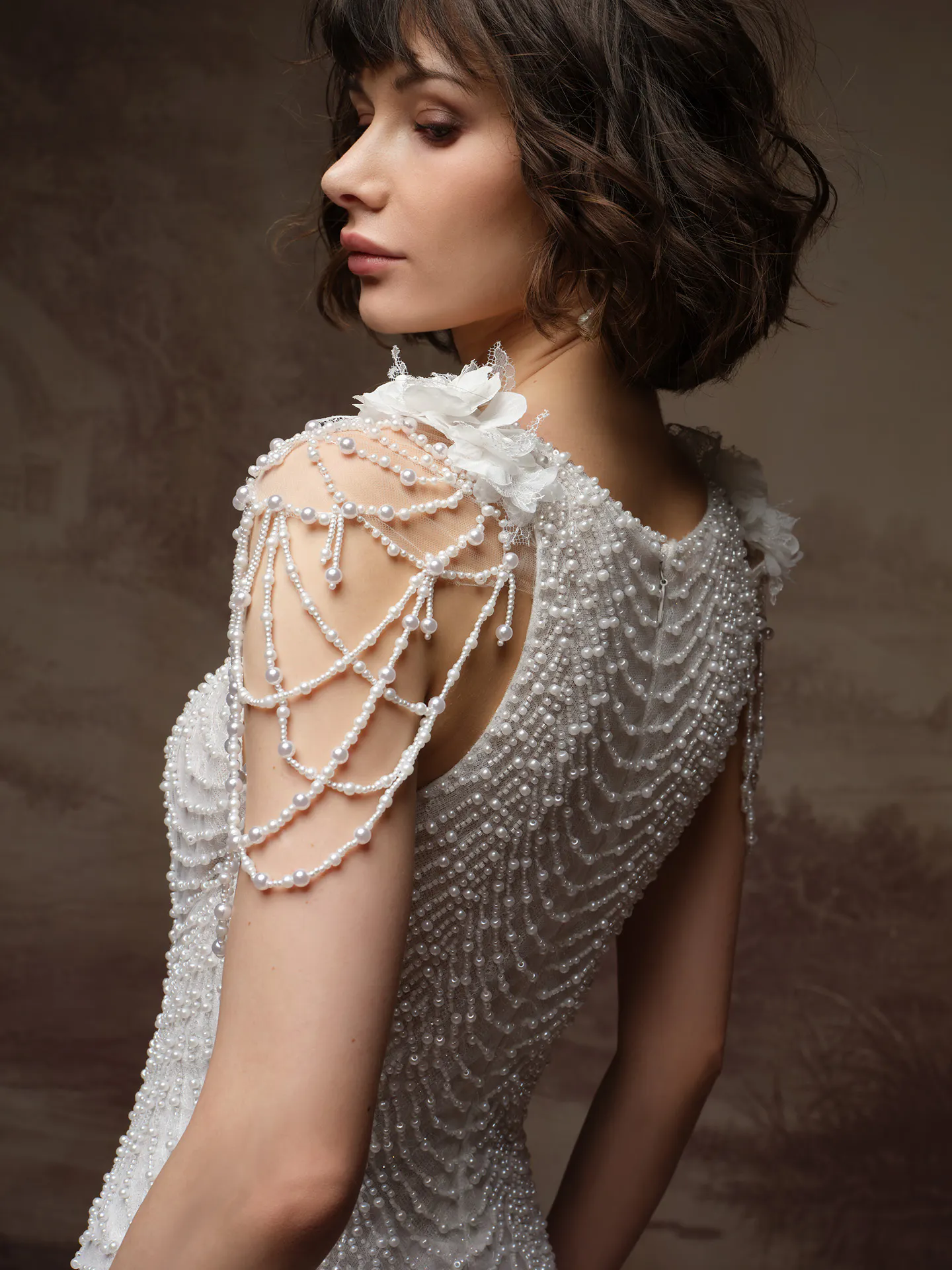 Sottero and Midgley Oleta, side view with pearl lace detail on shoulder and back.