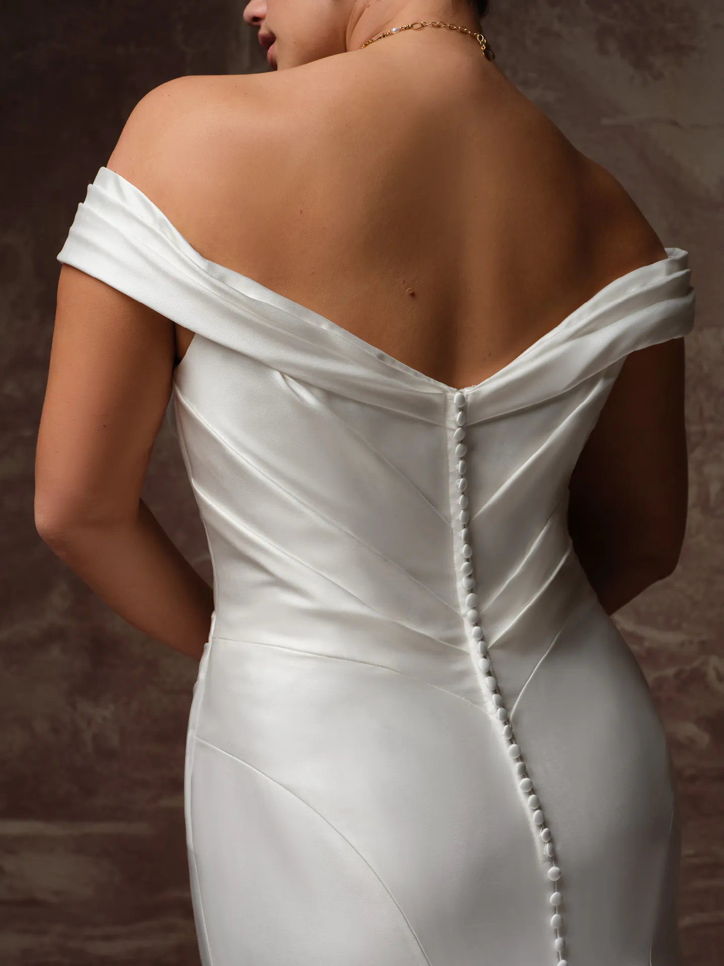Sottero and Midgley Recine, back view satin fit-and-flare wedding dress.