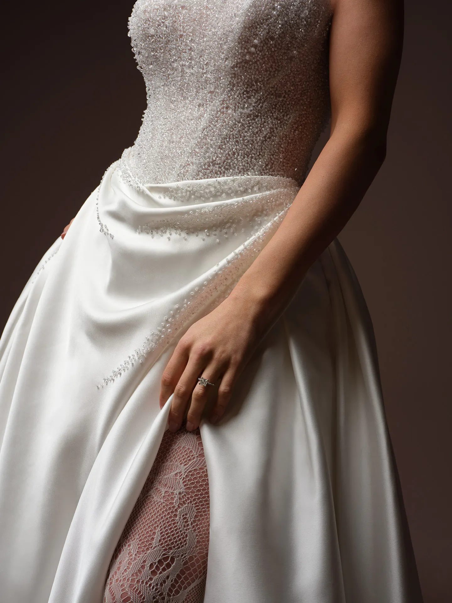 Sottero and Midgley Rumi beaded bodice ballgown with lace detail, front view.