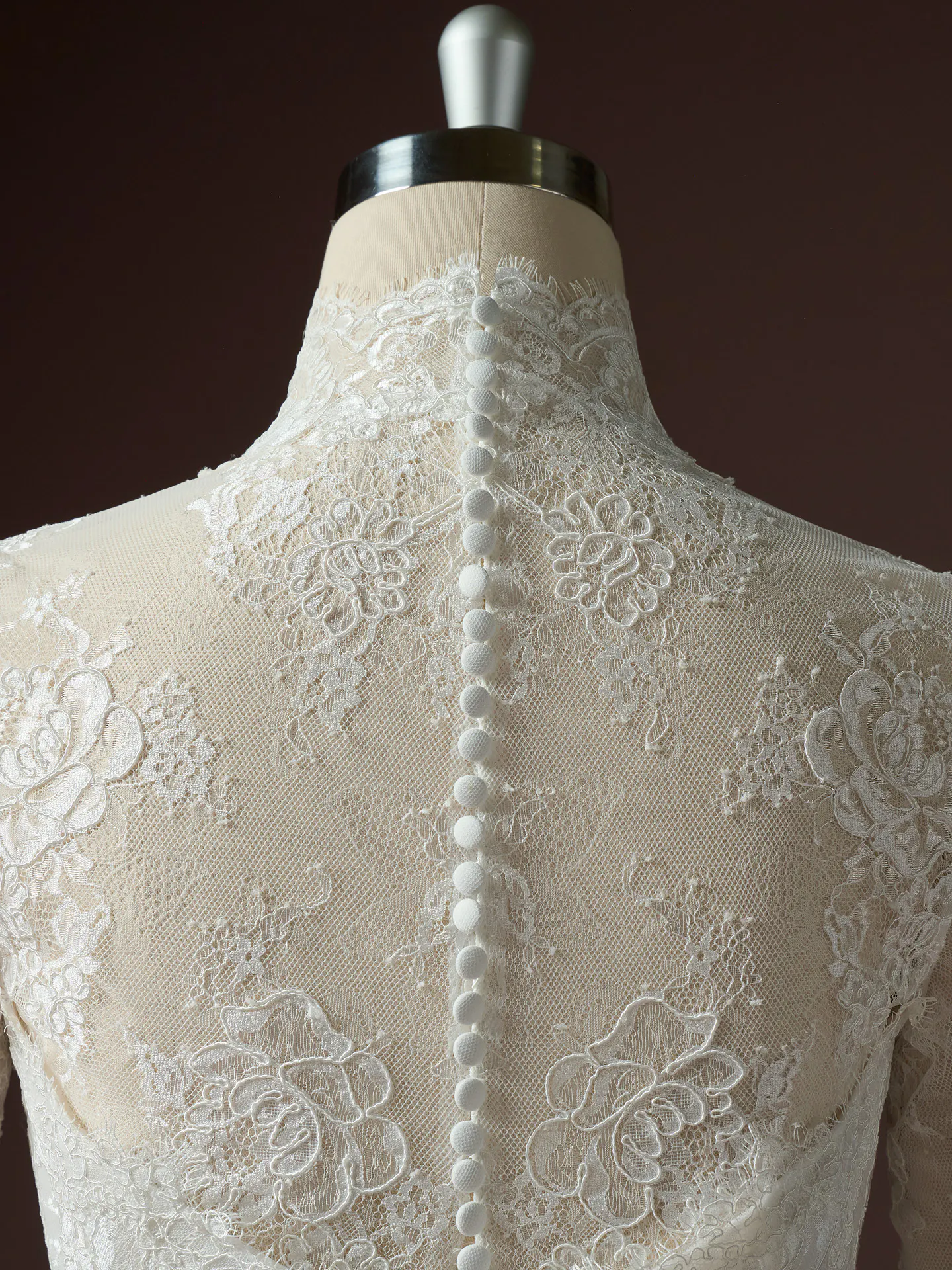Lace detail of, back view on Vespera A-Line dress by Sottero and Midgley.