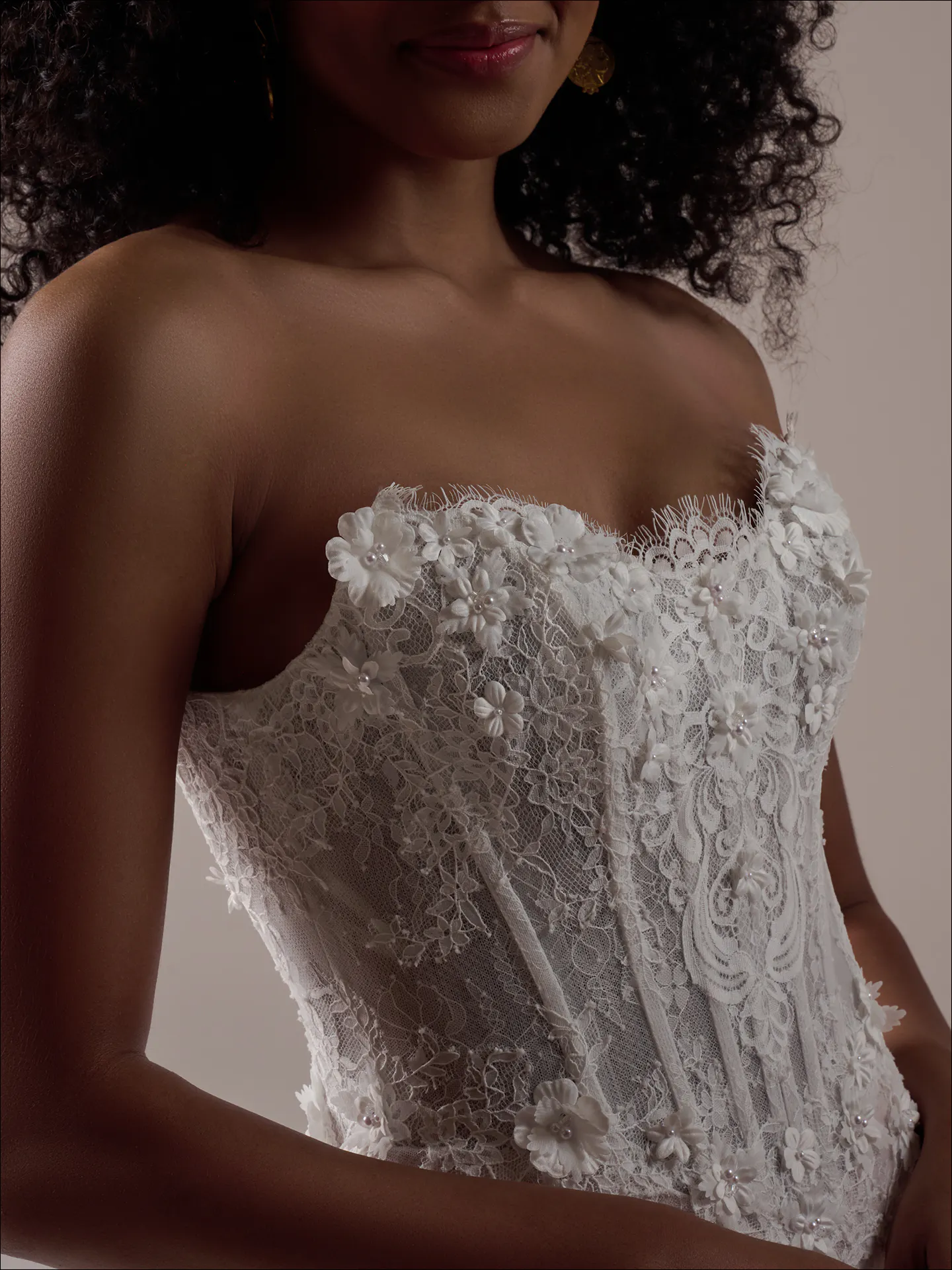 Maggie Sottero Takera fit and flare wedding dress back view with flowing lace train
