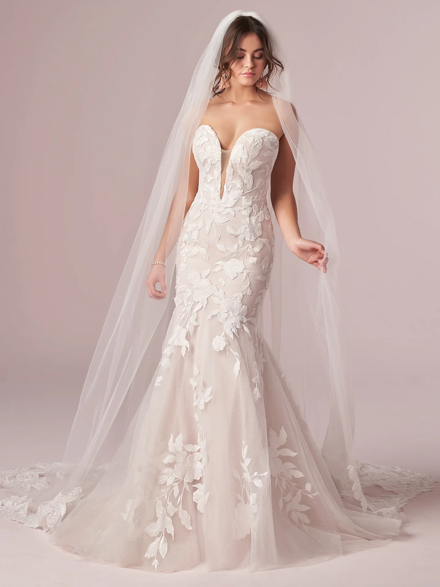 Rebecca Ingram Hattie front view strapless mermaid lace bridal gown with floral accents